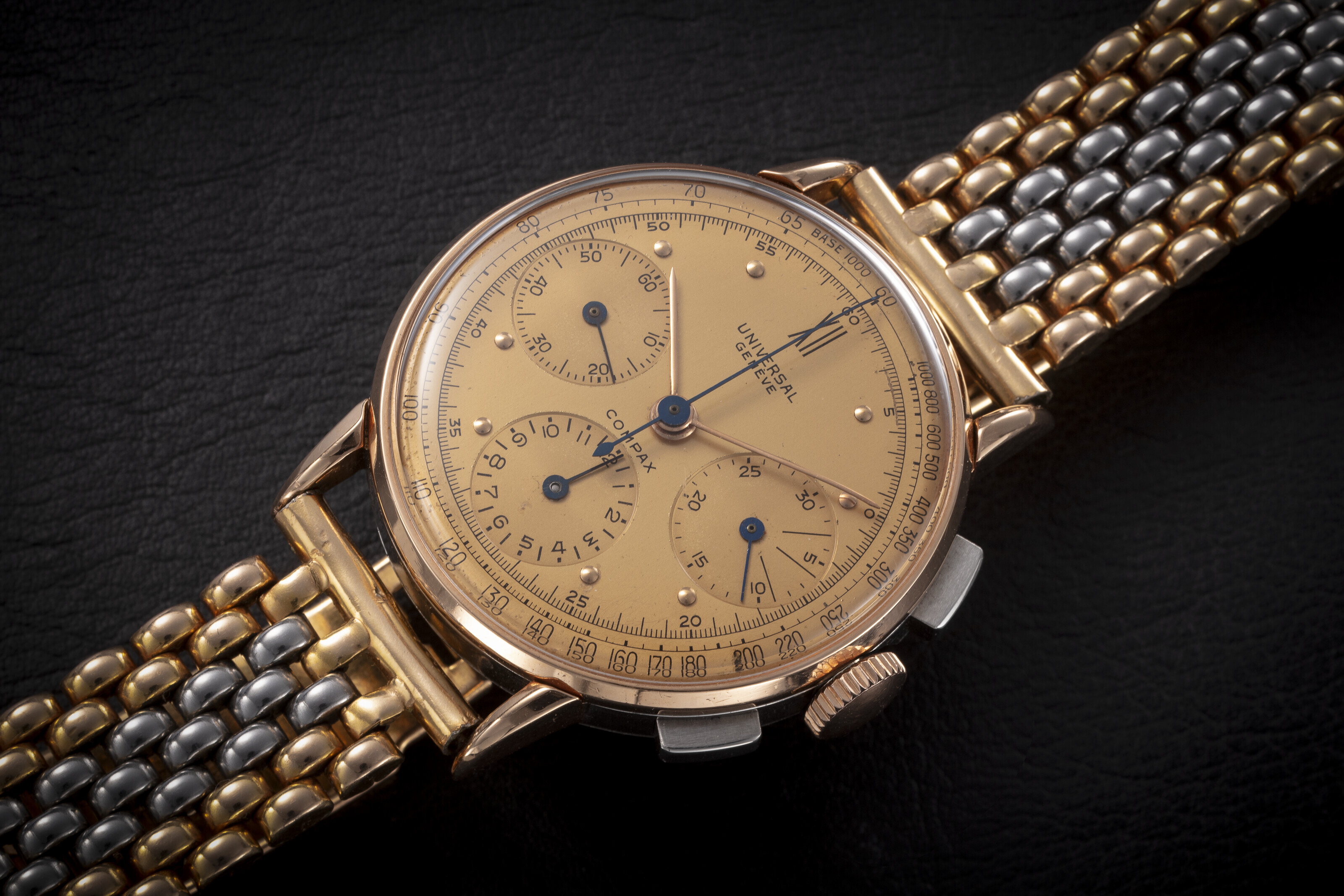 UNIVERSAL GENEVE, COMPAX, AN ELEGANT TWO-TONE CHRONOGRAPH WITH TWO-TONE ...