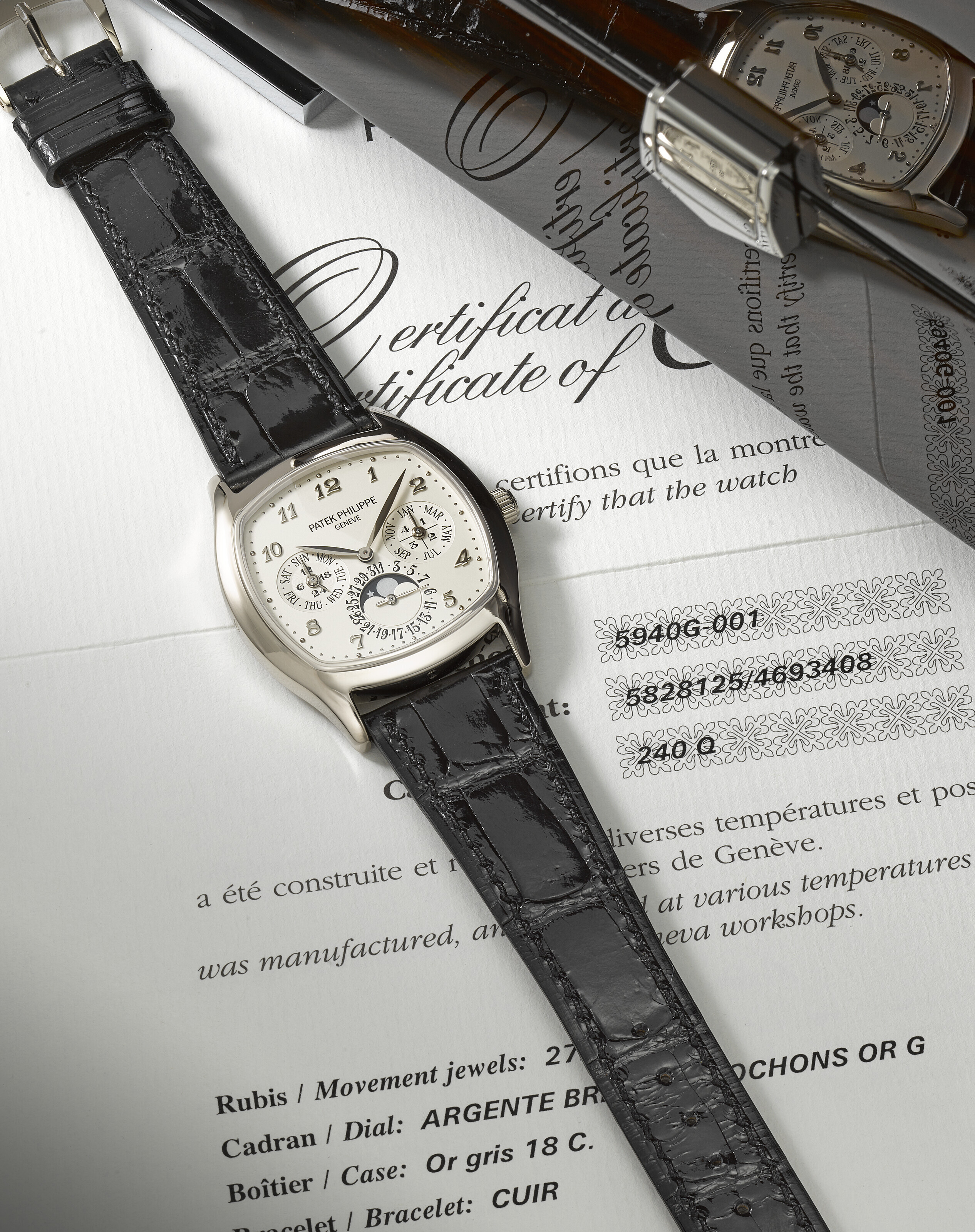 PATEK PHILIPPE. A RARE 18K WHITE GOLD PERPETUAL CALENDAR CUSHION