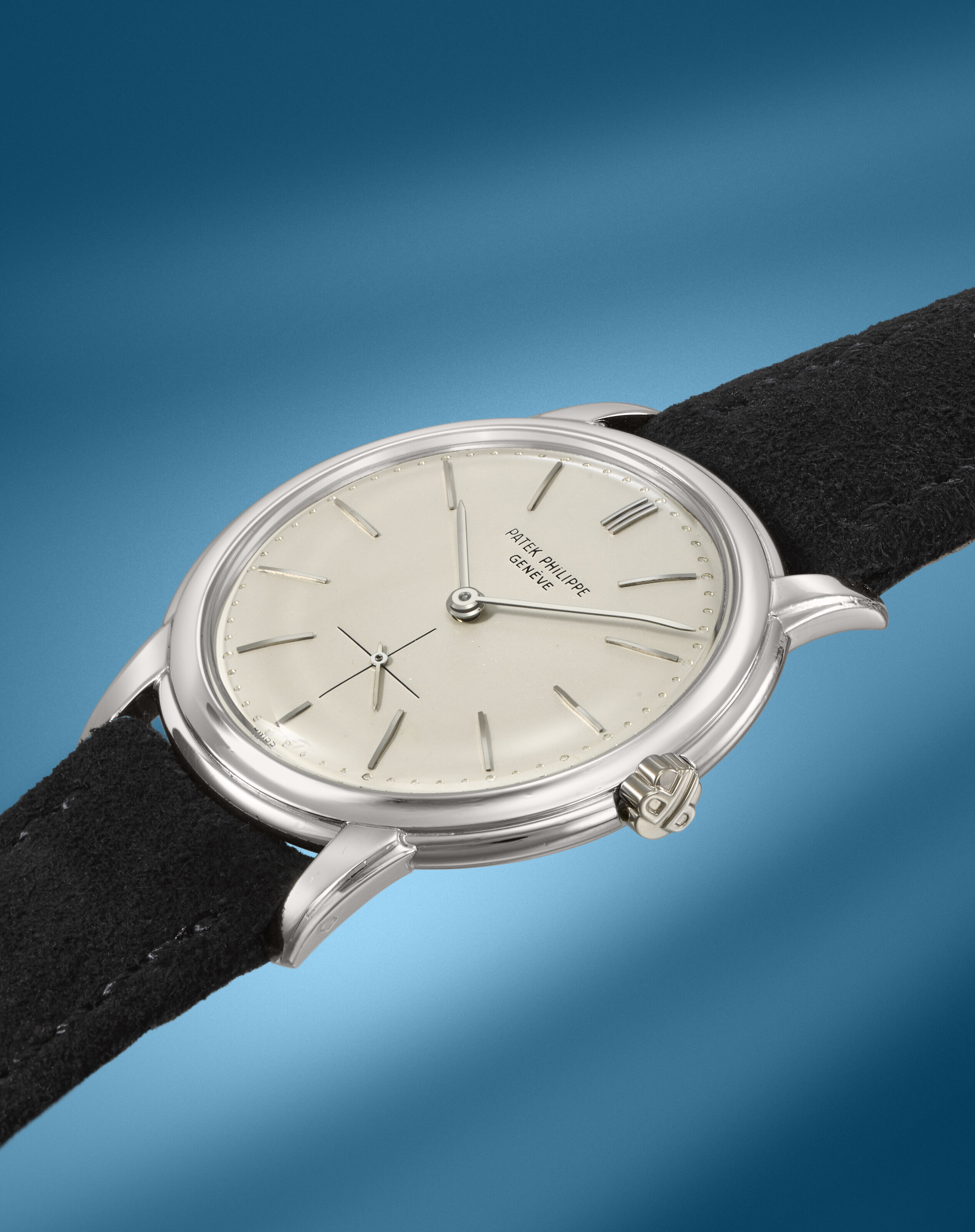 PATEK PHILIPPE. AN EXTREMELY RARE AND ELEGANT PLATINUM AUTOMATIC