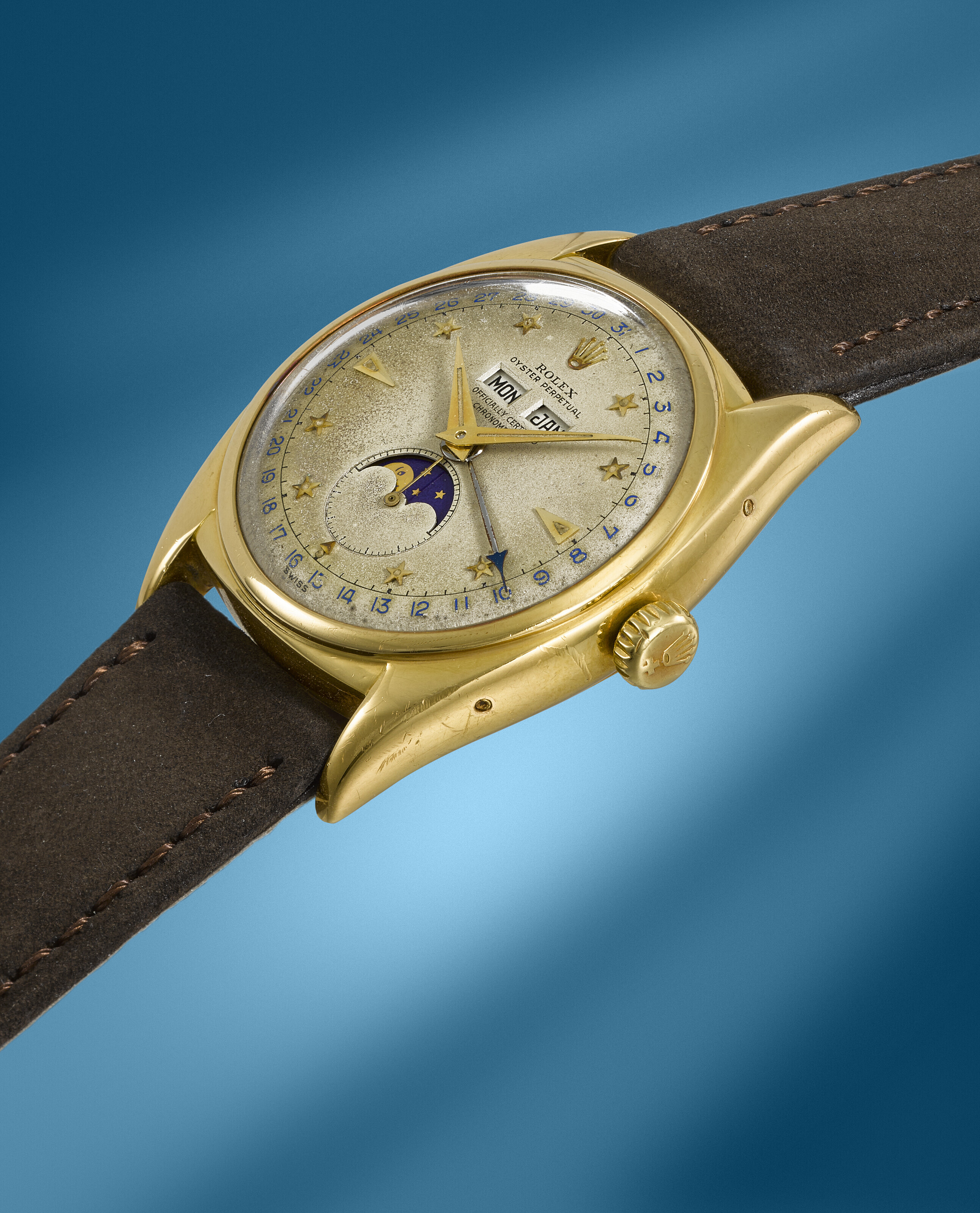 ROLEX. A VERY RARE 18K GOLD AUTOMATIC TRIPLE CALENDAR WRISTWATCH