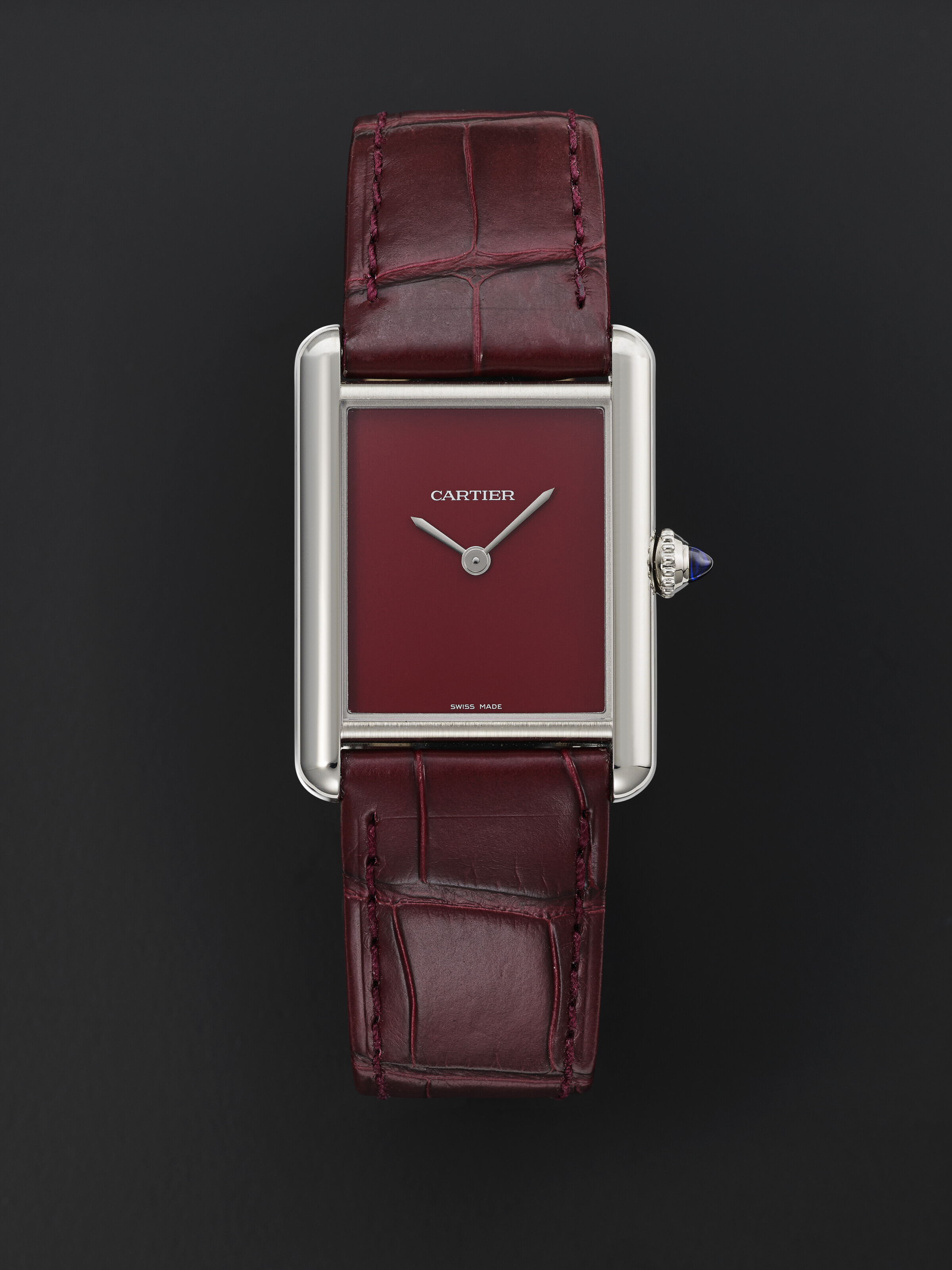 CARTIER, STEEL 'TANK MUST' RED, REF. WSTA0054, | Christie's