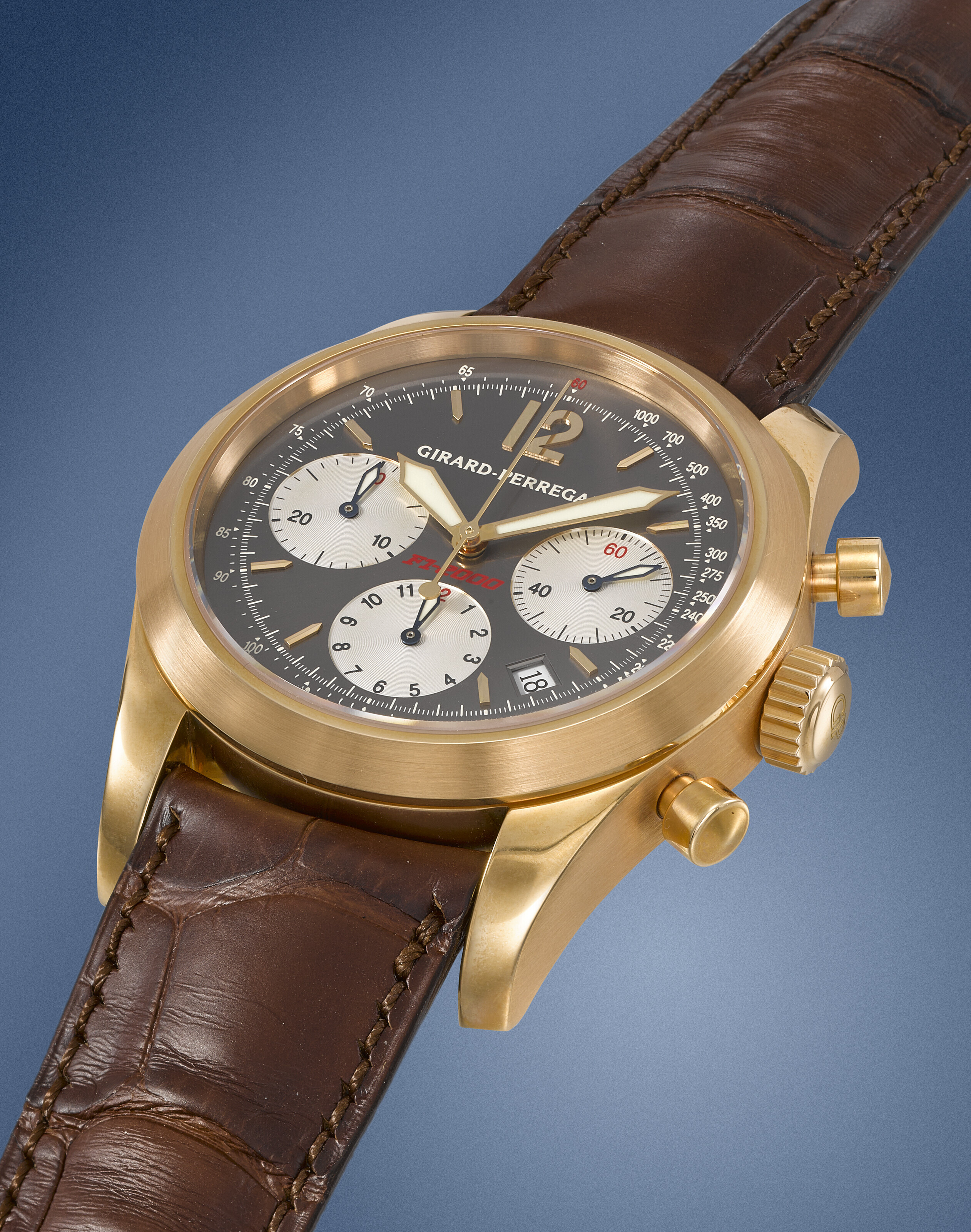 GIRARD PERREGAUX. A RARE 18K PINK GOLD AUTOMATIC CHRONOGRAPH