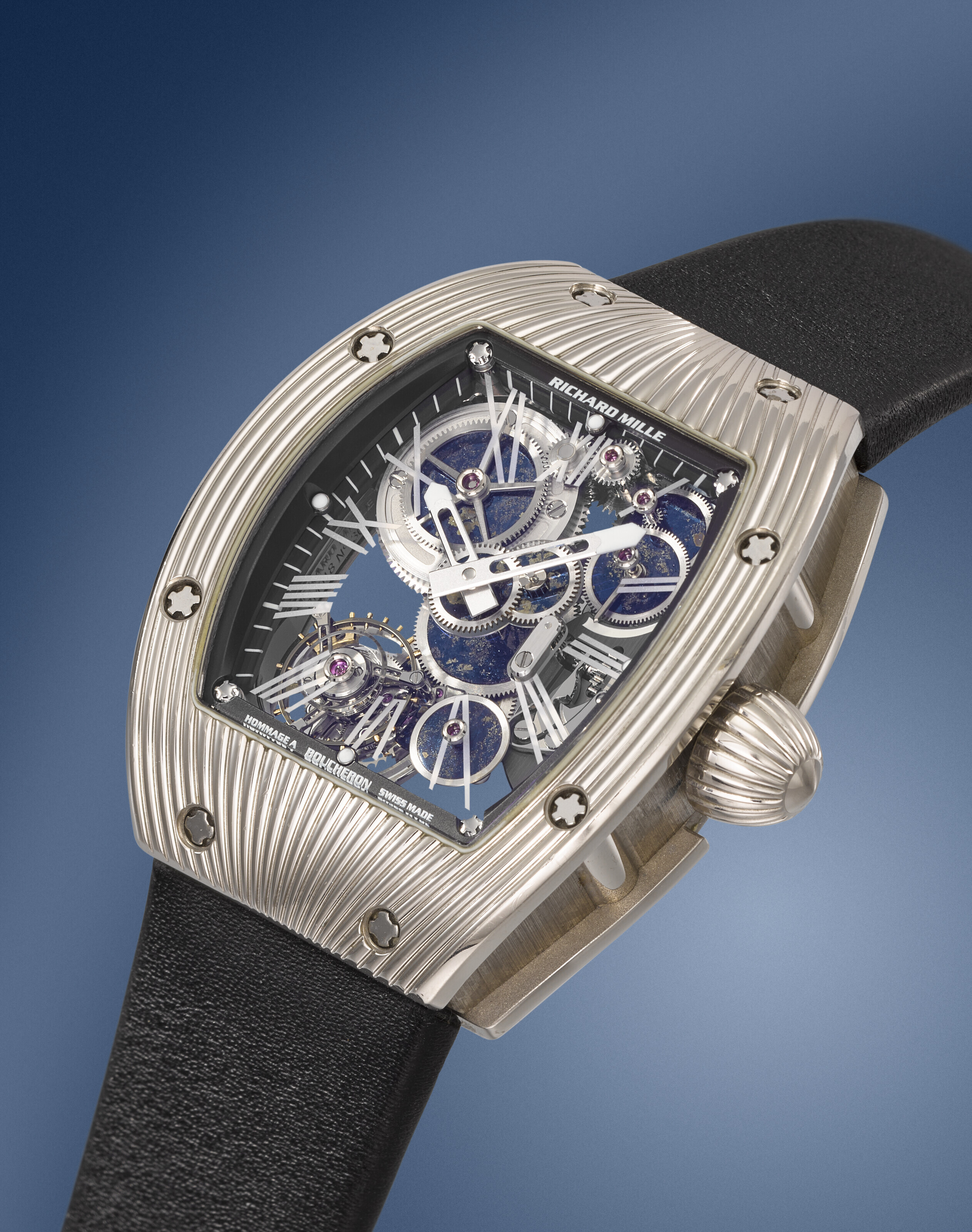RICHARD MILLE. A UNIQUE 18K WHITE GOLD SKELETONIZED TOURBILLON WRISTWATCH  WITH BLUED AND GOLD MINERAL-SET WHEELS AND BOX, MADE TO COMMEMORATE THE  150TH ANNIVERSARY OF BOUCHERON, SIGNED RICHARD MILLE, REF. RM018 AI