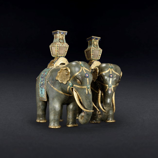 A MAGNIFICENT PAIR OF CLOISONNÉ ENAMEL FIGURES OF CAPARISONED ELEPHANTS ...