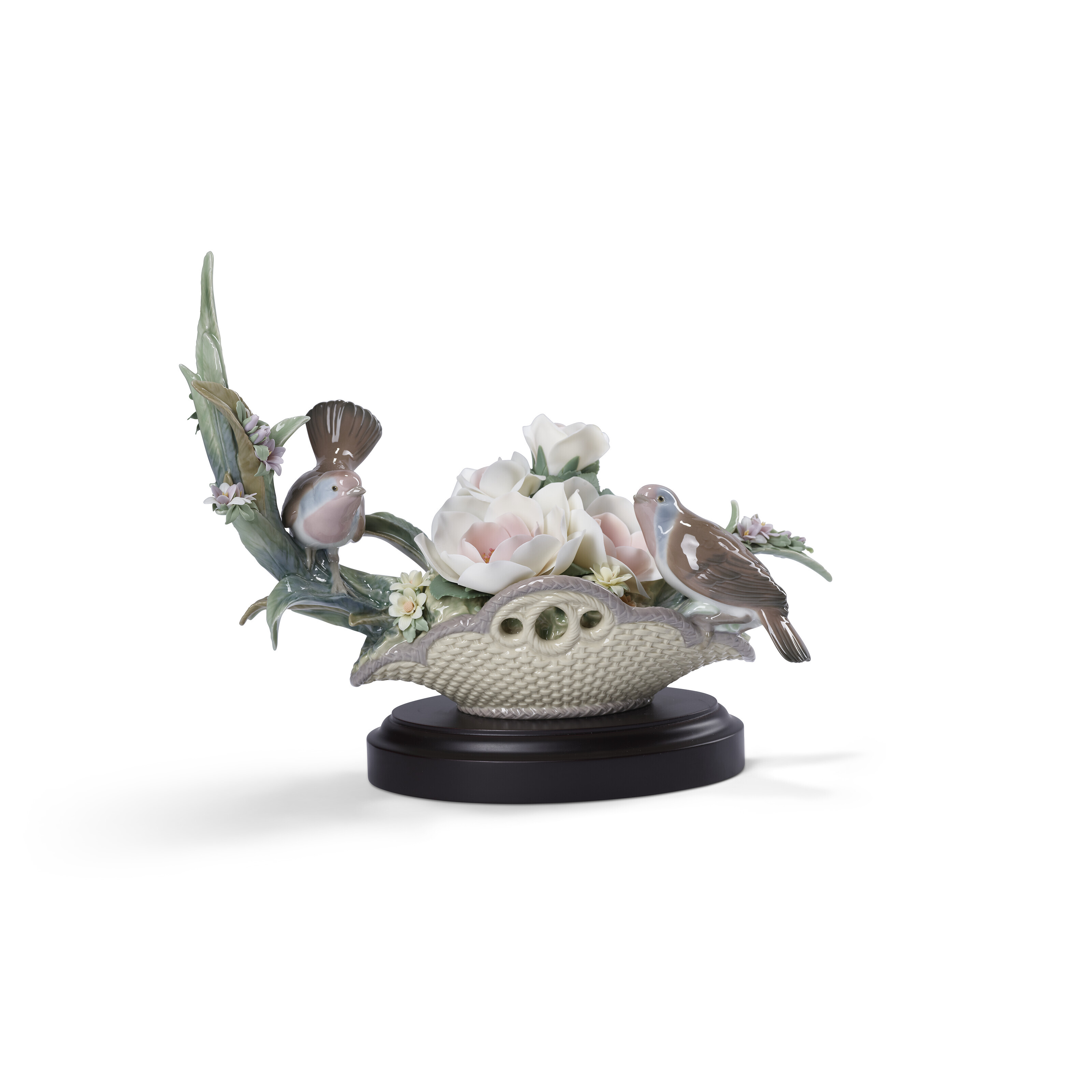 A LLADRÓ BIRDS AND FLOWERS PORCELAIN FIGURINE, Christie’s