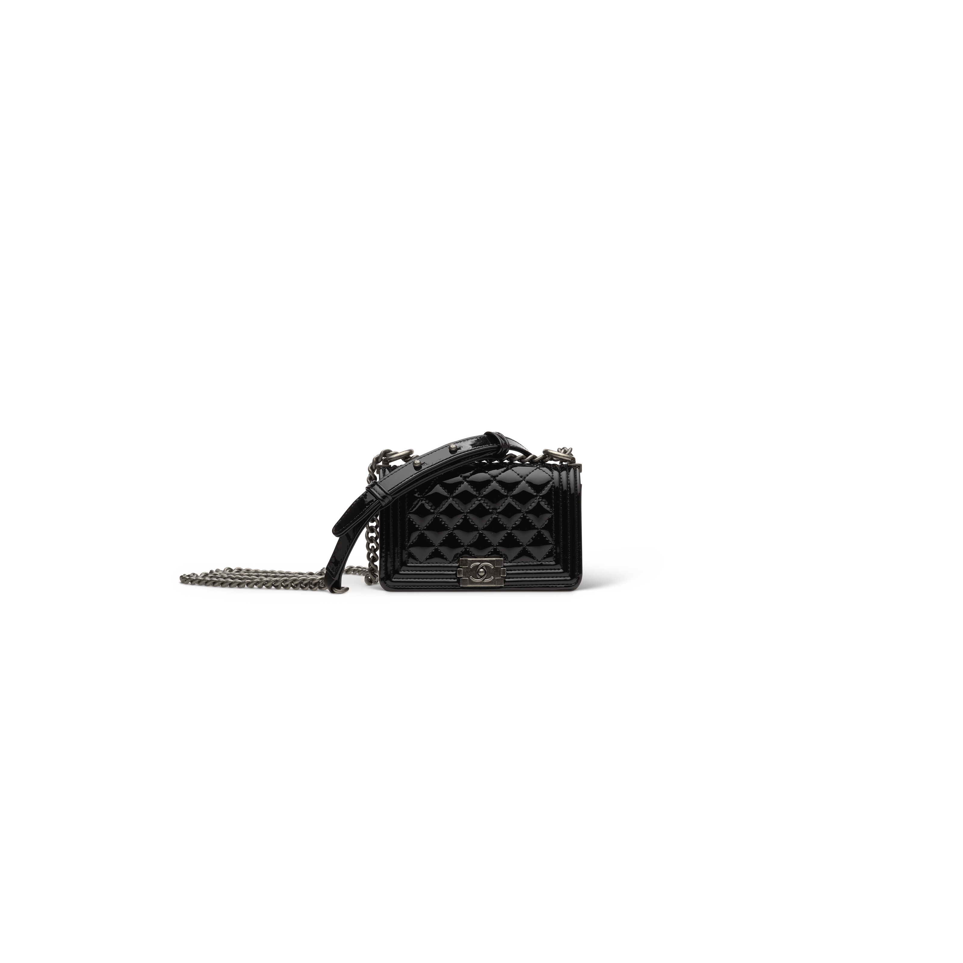 A LIMITED EDITION SET OF FOUR MINI BAGS WITH BLACK QUILTED