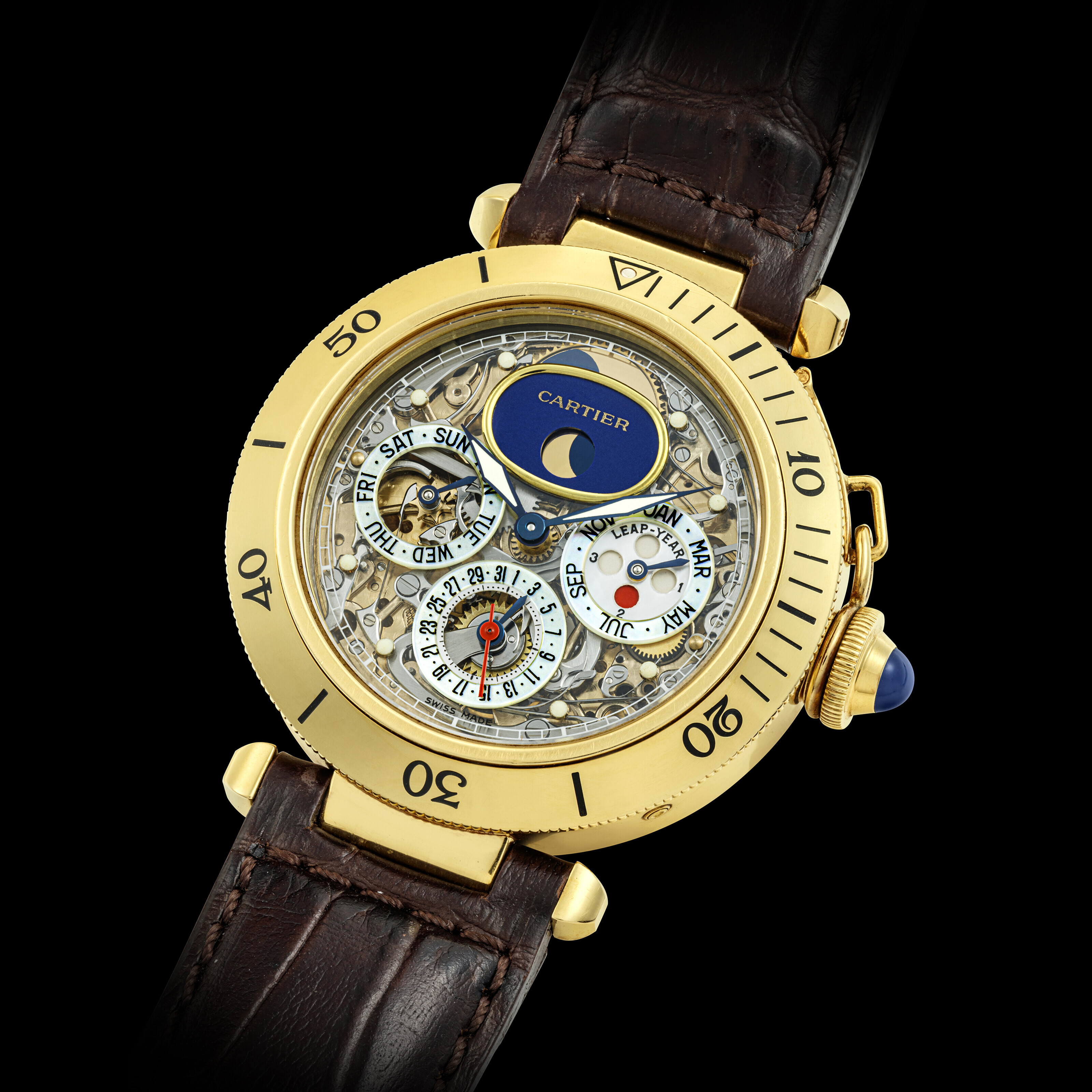 CARTIER. A RARE 18K GOLD AUTOMATIC SEMI SKELETONISED TOURBILLON PERPETUAL CALENDAR WRISTWATCH WITH MOON PHASES LEAP YEAR INDICATION AND MOTHER OF PEARL SUB DIALS PASHA TOURBILLON PERPETUAL CALENDAR MO...