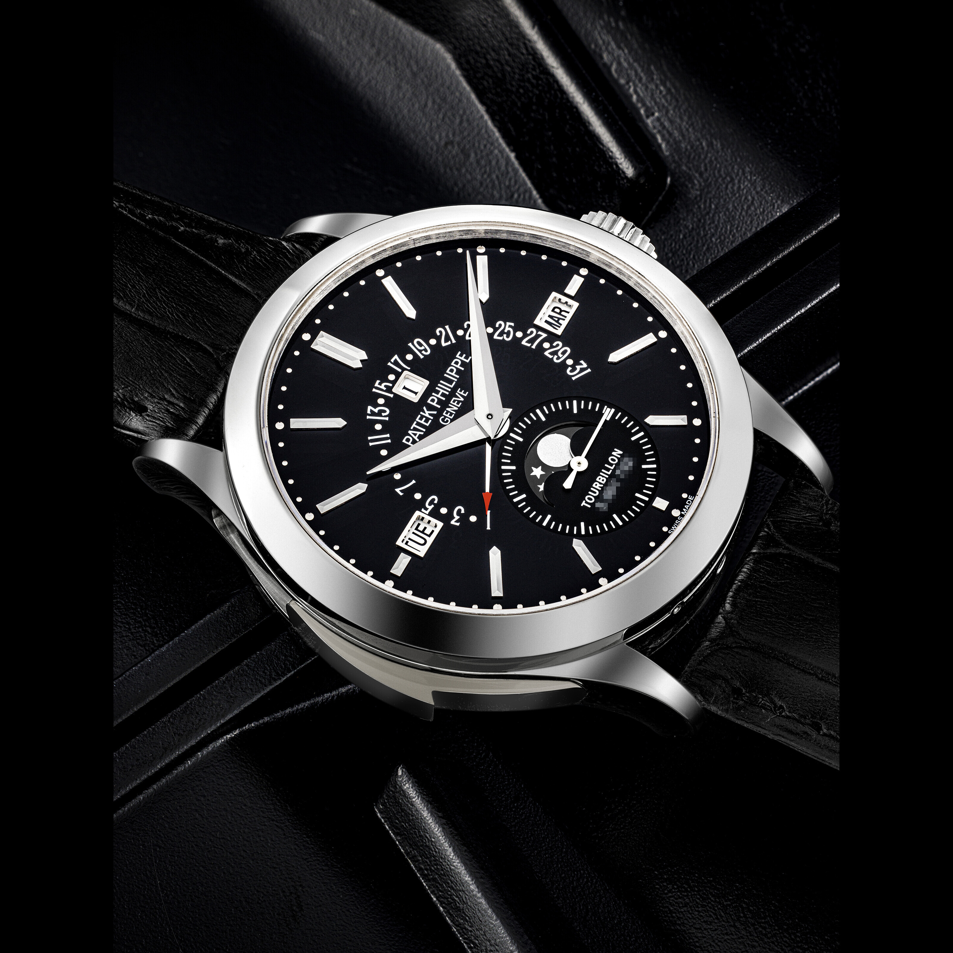 PATEK PHILIPPE. A VERY RARE AND HIGHLY COMPLICATED PLATINUM MINUTE
