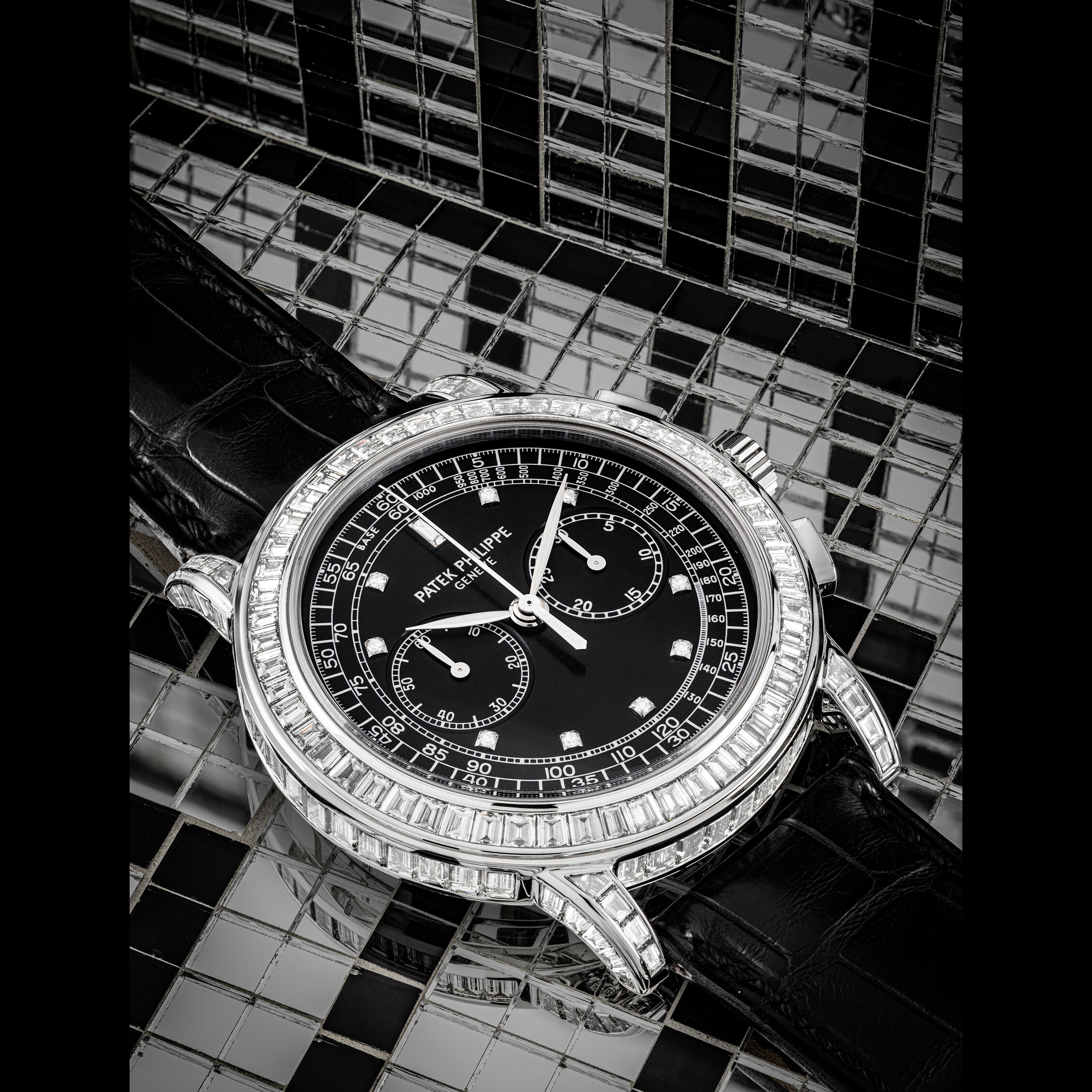 PATEK PHILIPPE. A VERY RARE 18K WHITE GOLD AND BAGUETTE CUT