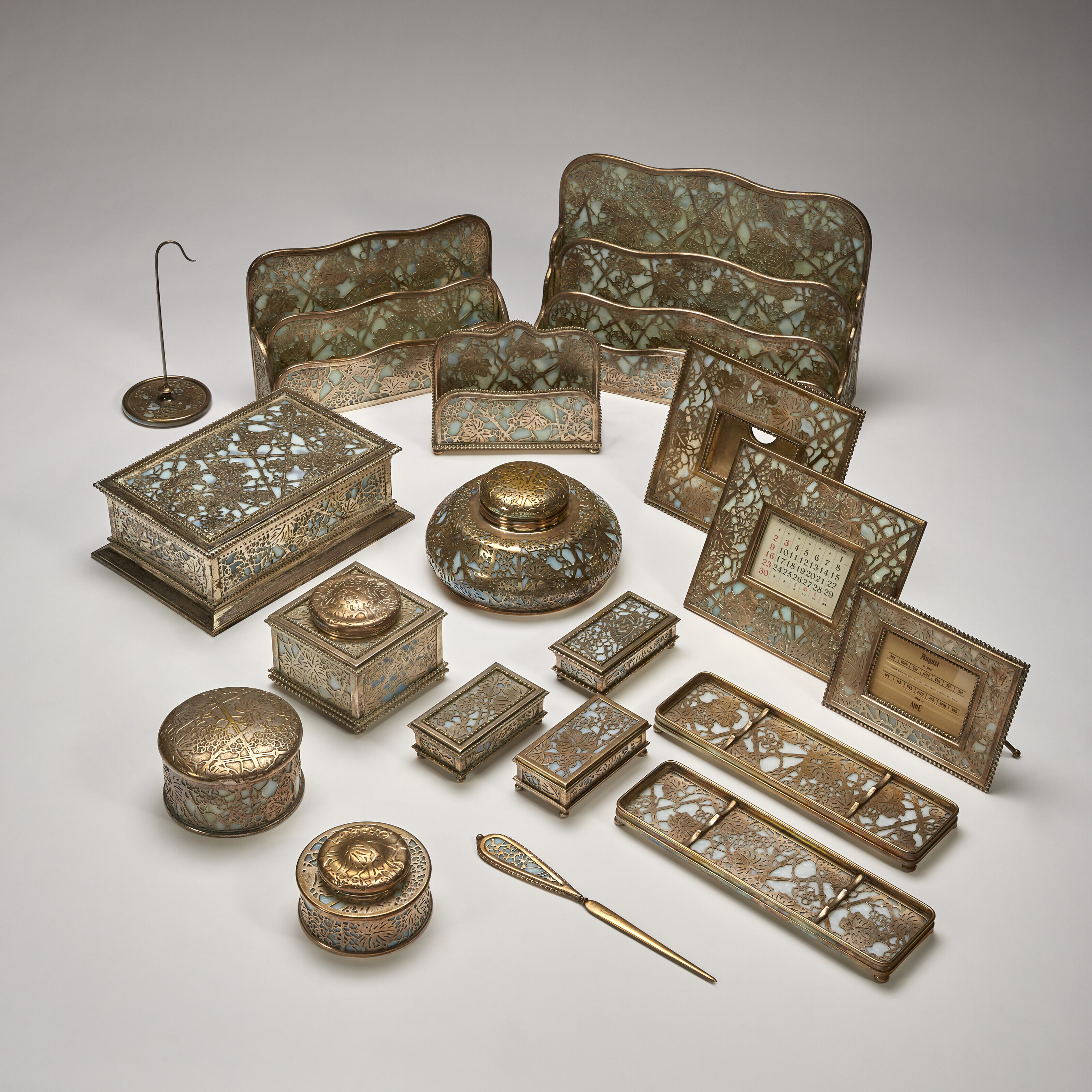 TIFFANY STUDIOS, Eighteen-Piece 'Grapevine' Desk Set, circa 1915