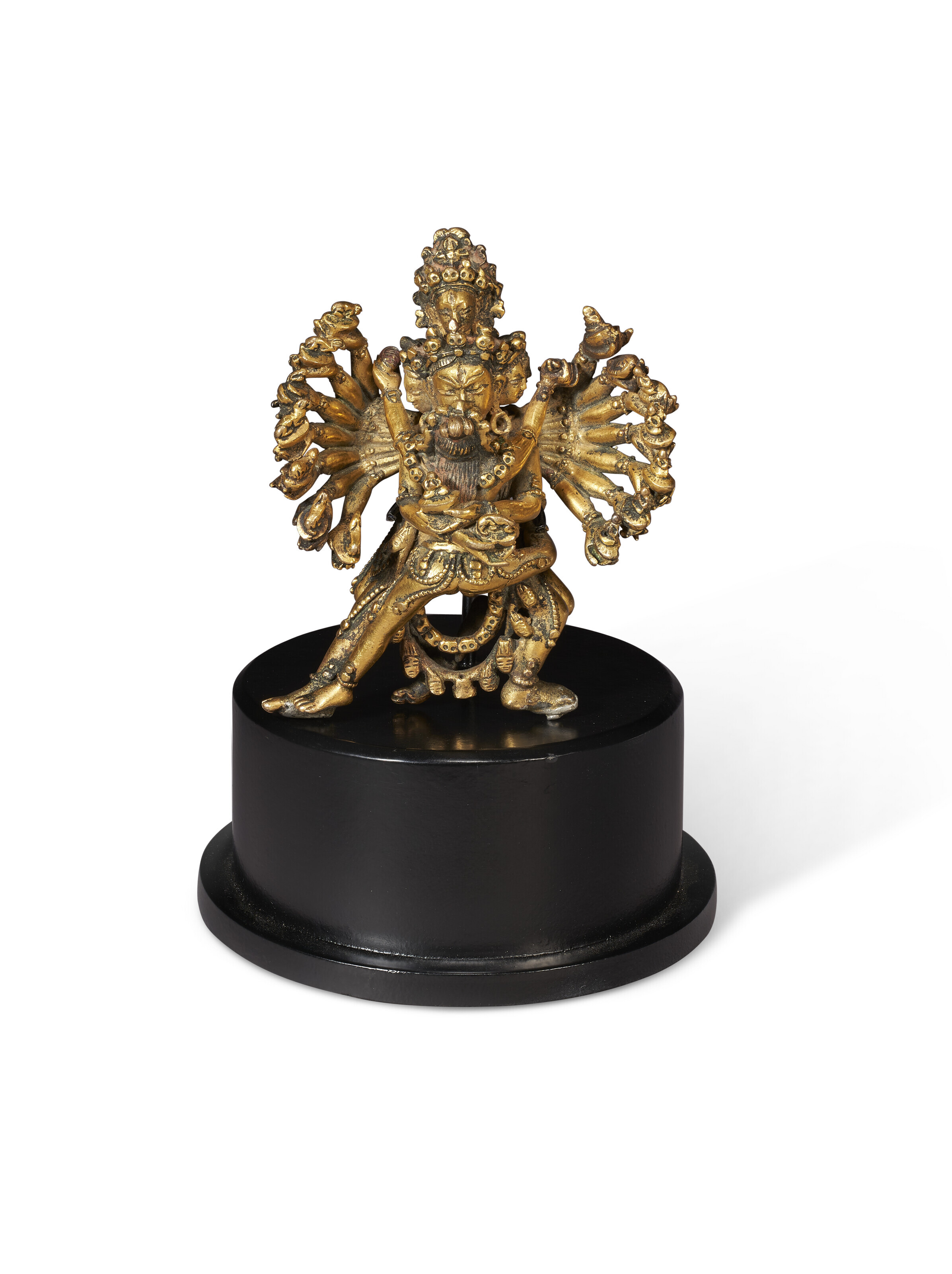 A SMALL AND RARE GILT BRONZE FIGURE OF KAPALADHARA HEVAJRA, TIBET, 15TH CENTURY | Christies
