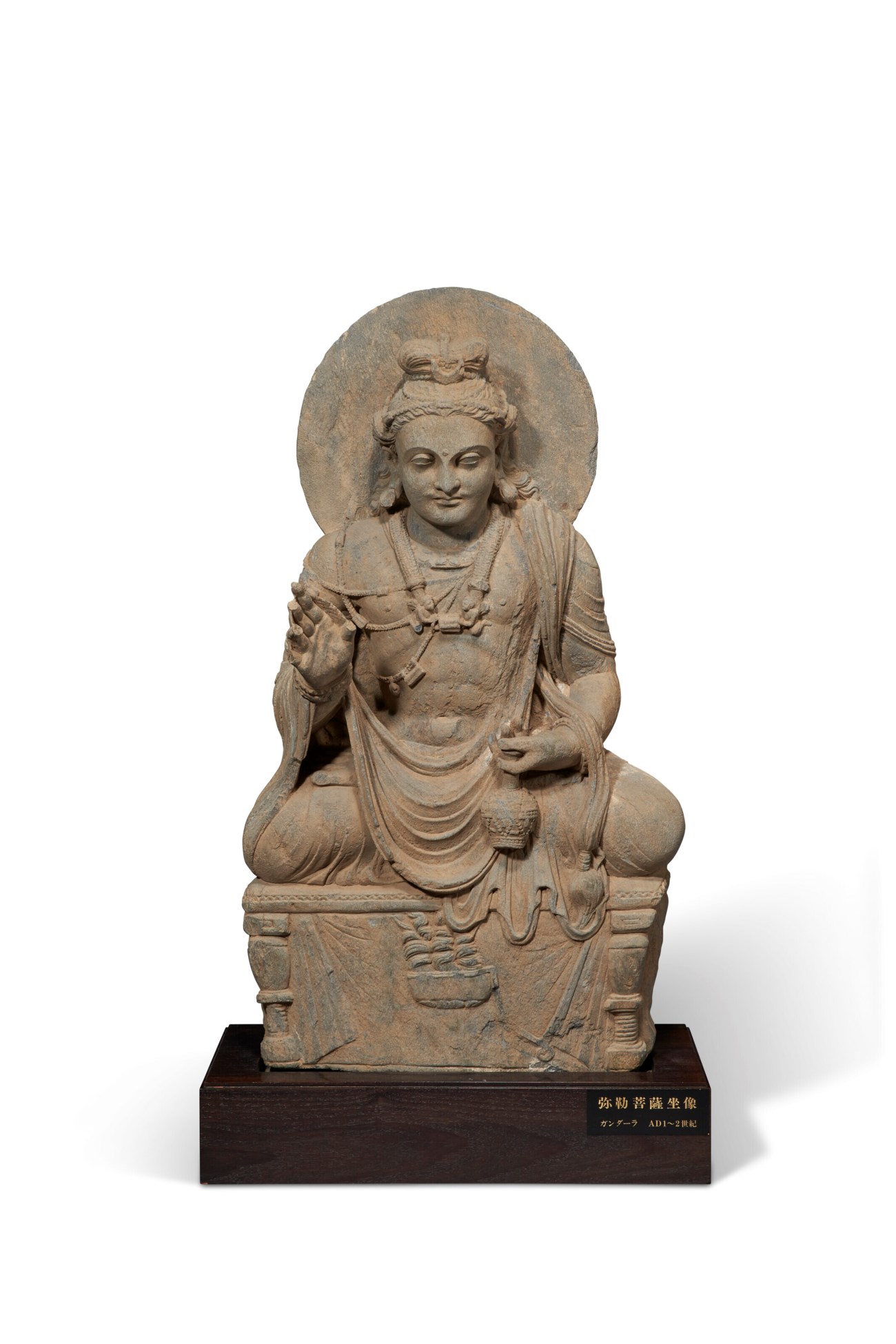 A LARGE GREY SCHIST FIGURE OF SEATED MAITREYA, ANCIENT REGION OF ...