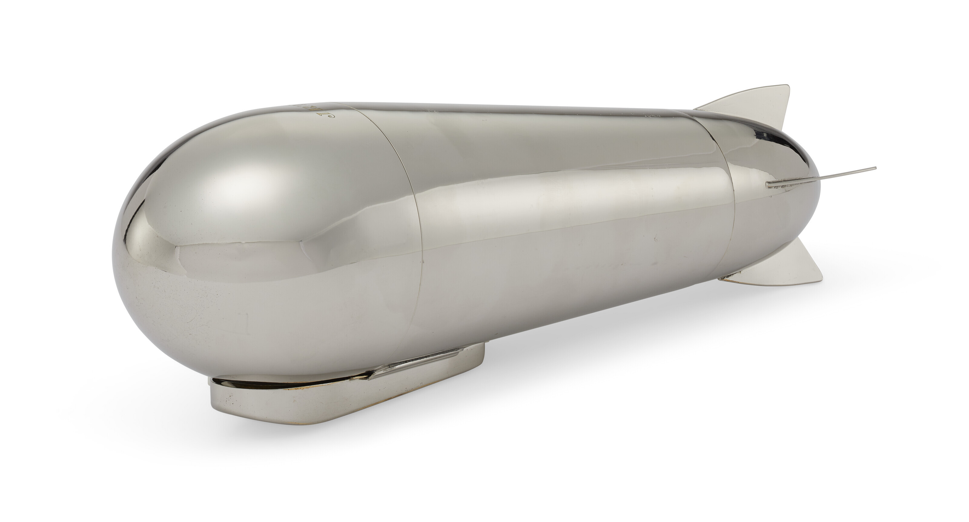 A GERMAN SILVER-PLATED 'ZEPPELIN' COCKTAIL SHAKER, DESIGNED BY