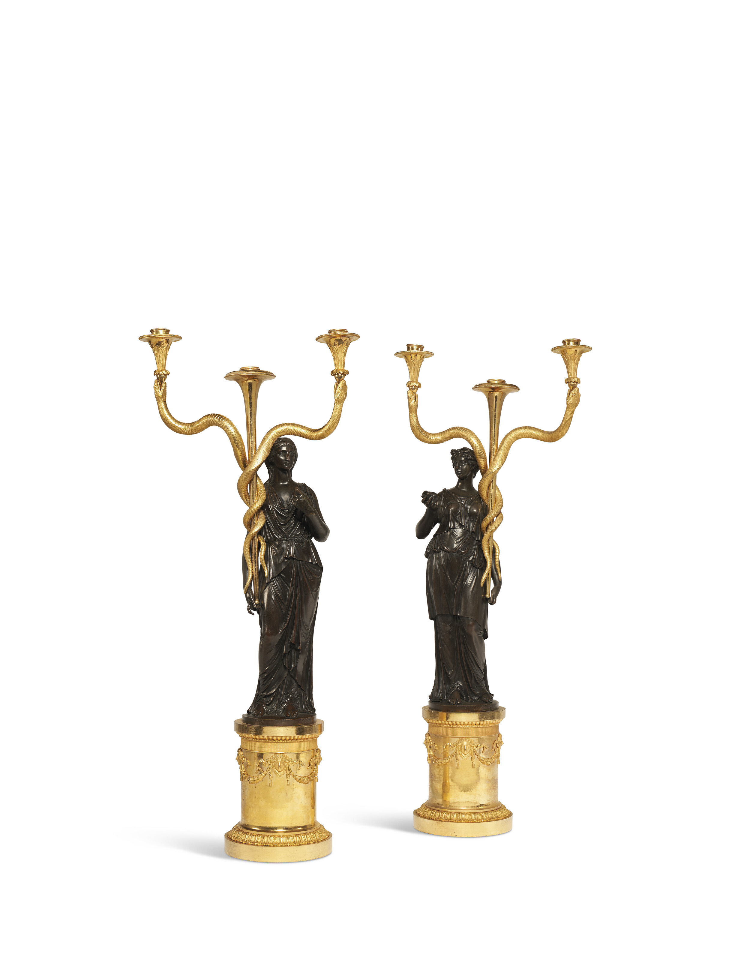 Pair of French Consulat Ormolu Candlesticks