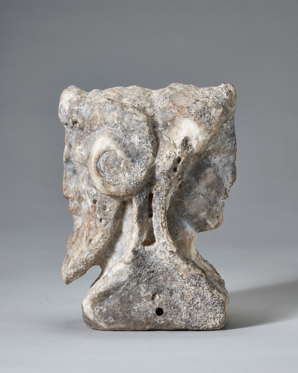 A ROMAN MARBLE JANIFORM HERM HEAD