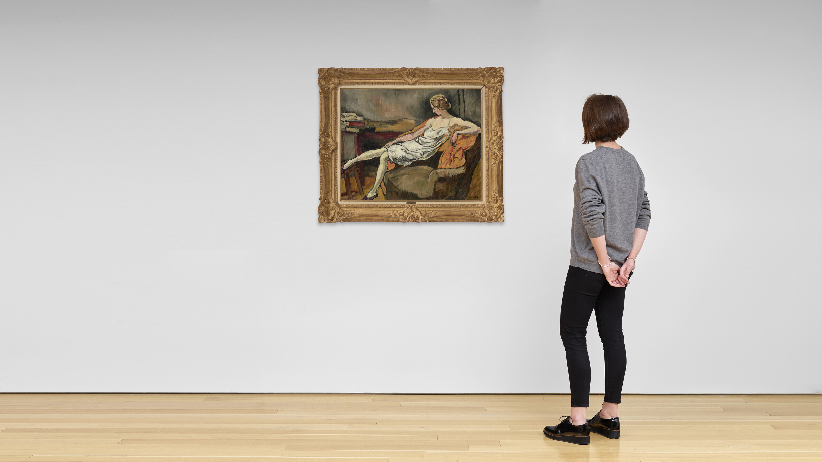 LOUIS VALTAT (1869-1952), Femme au fauteuil | Christie's