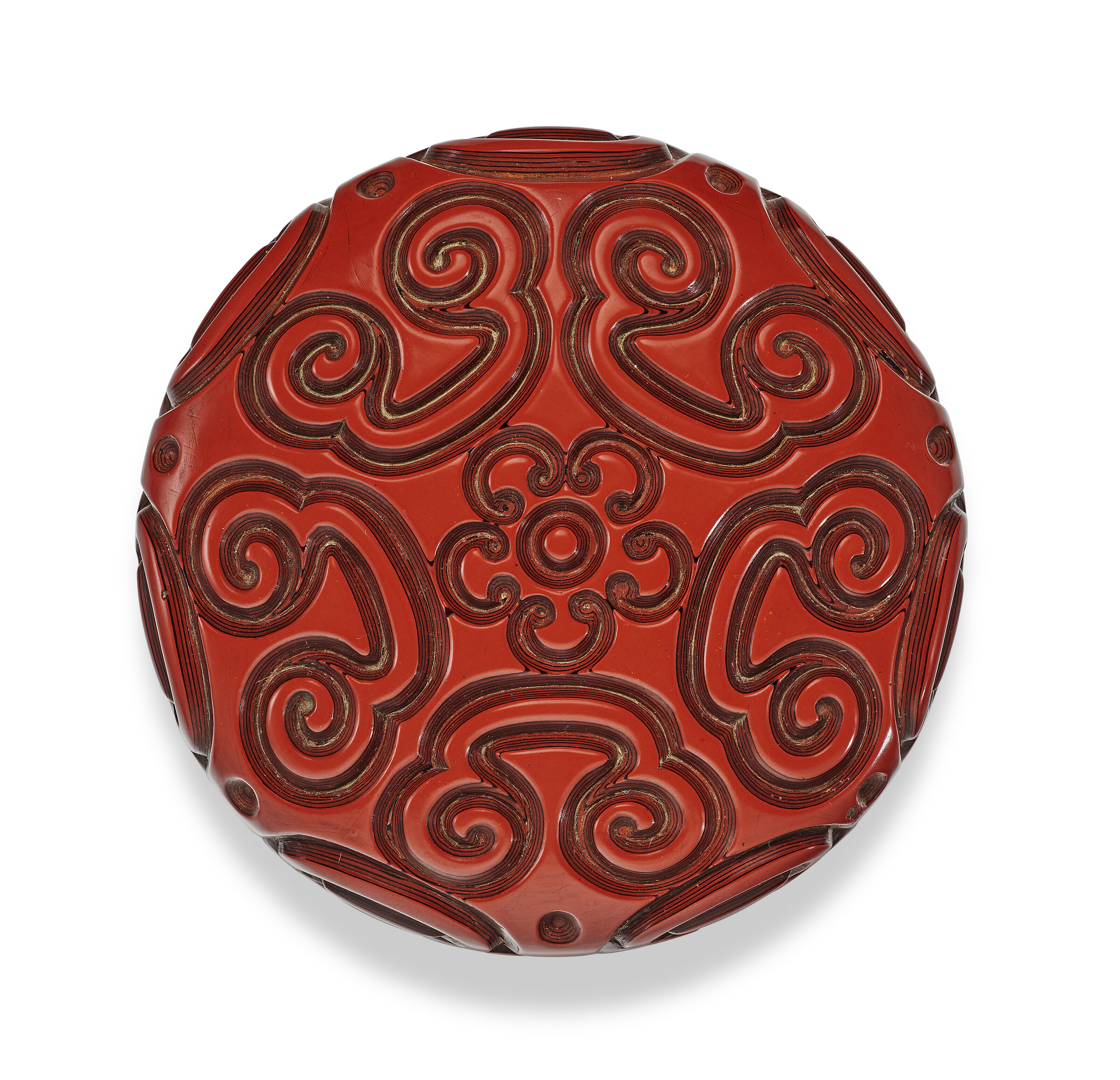 A CARVED THREE-TIERED RED TIXI LACQUER CIRCULAR BOX AND COVER