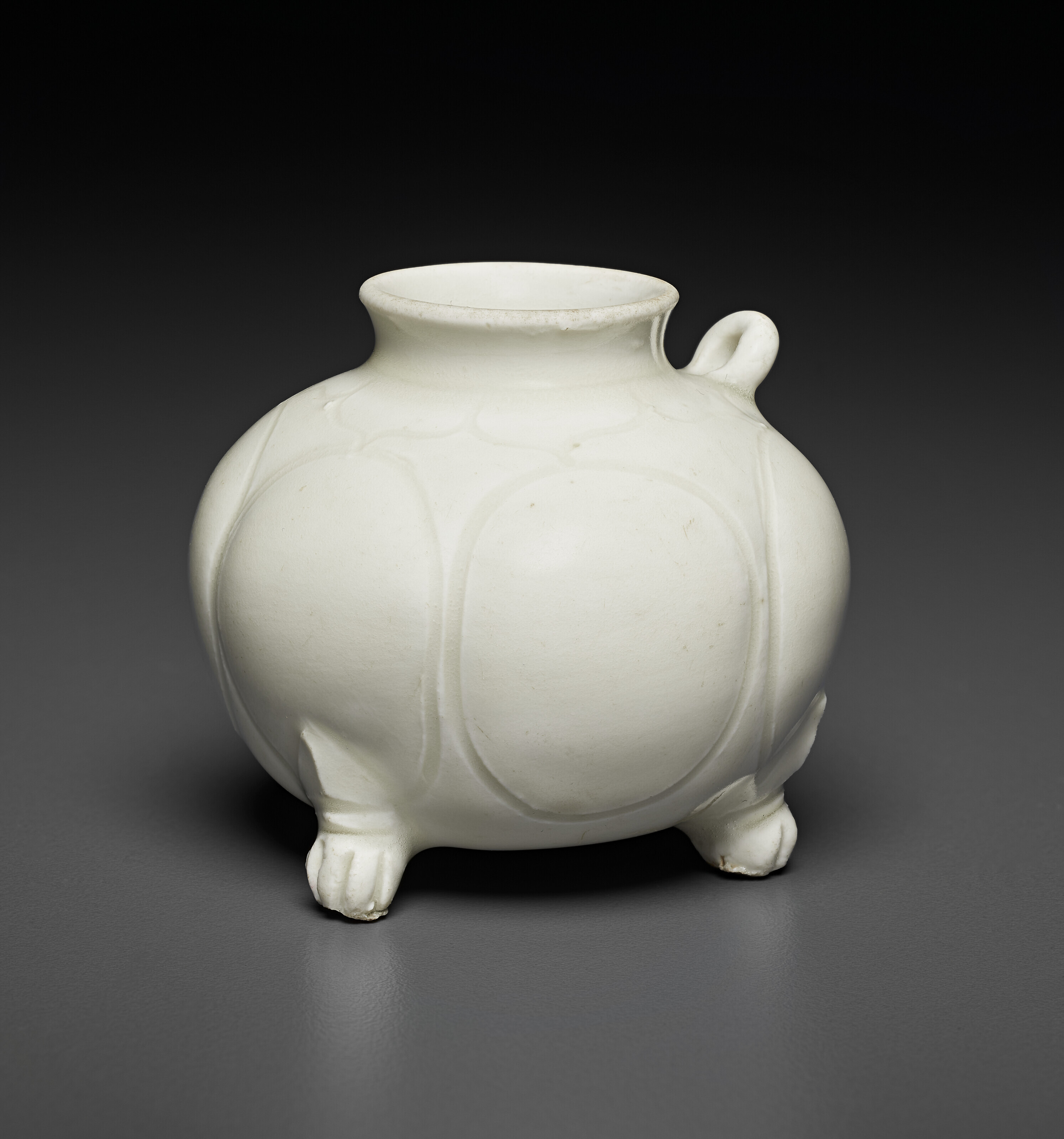 A CARVED CIZHOU BLACK-GLAZED JAR, JIN-YUAN DYNASTY, 13TH