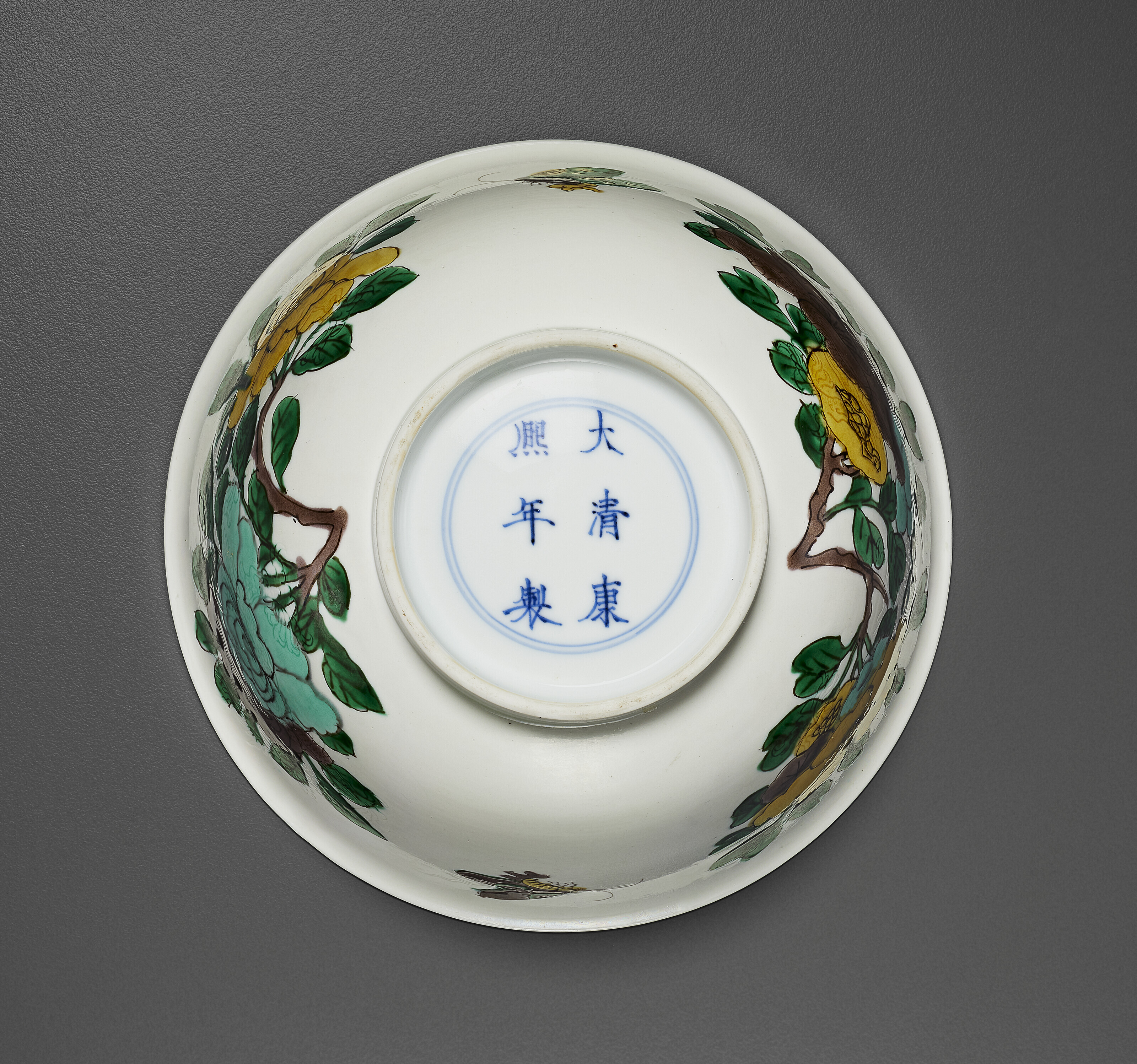 A SUSANCAI 'FLOWER AND FRUIT' BOWL WITH INCISED DRAGON, KANGXI SIX