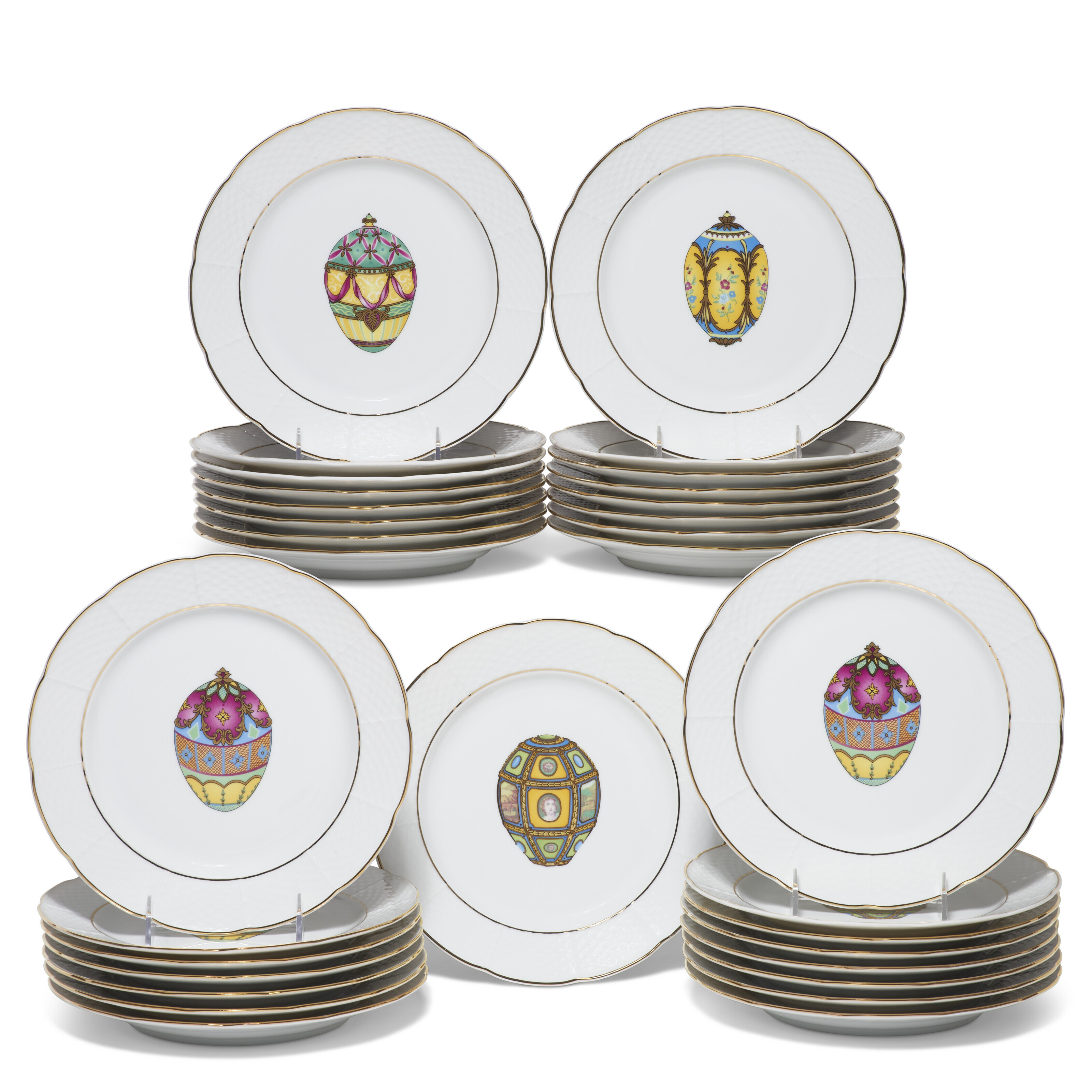 AN ASSEMBLED SET OF HENRIETTE PORCELAIN PLATES AND MATCHING LINENS
