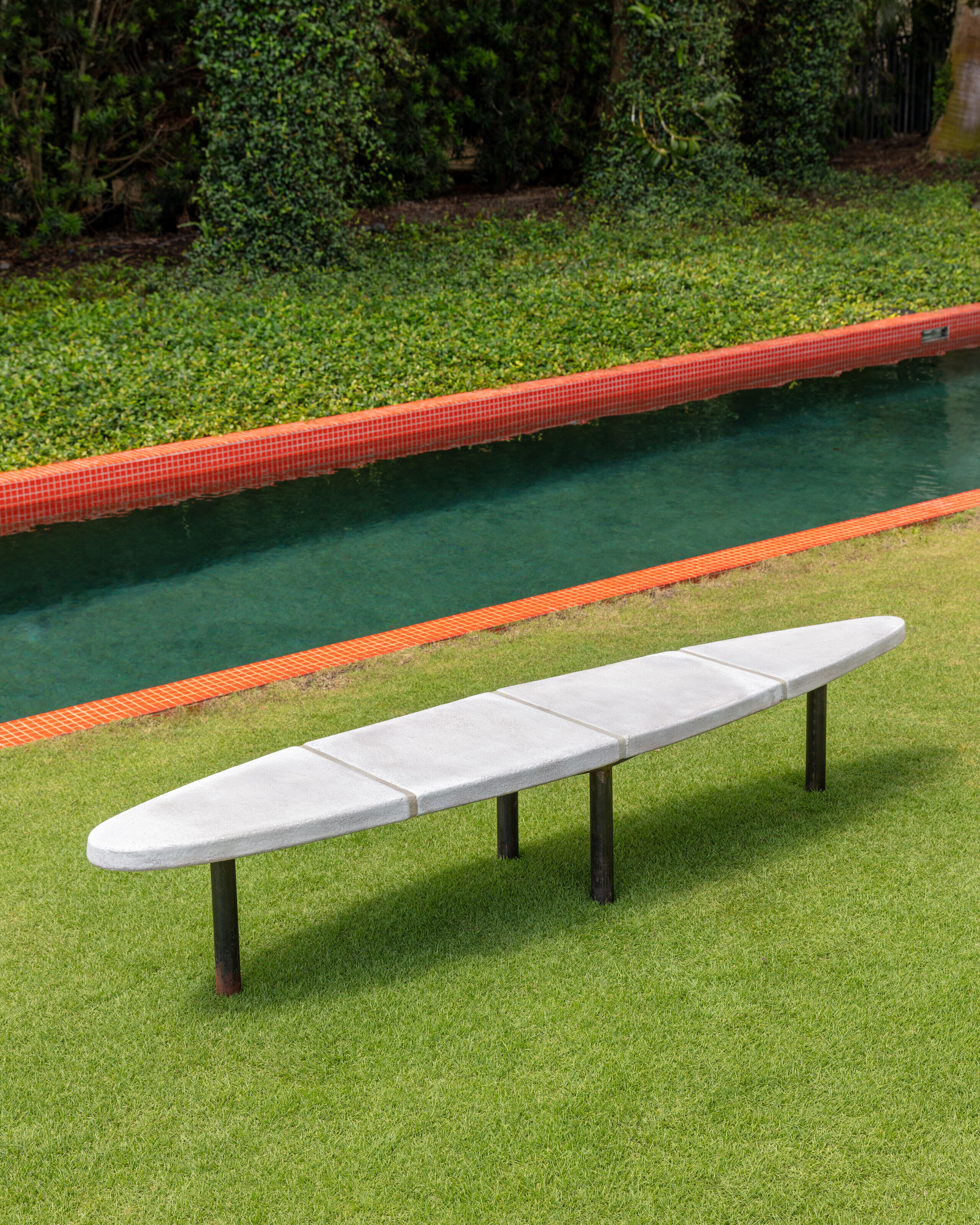 Georges Jouve (1910-1964), A rare low table, c. 1959. Glazed ceramic, painted steel. 14 x 76&frac12; x 15&frac14; in (35.6 x 194.3 x 38.7 cm). Sold for $441,000 in Design on 7 June 2022 at Christie&rsquo;s in New York
