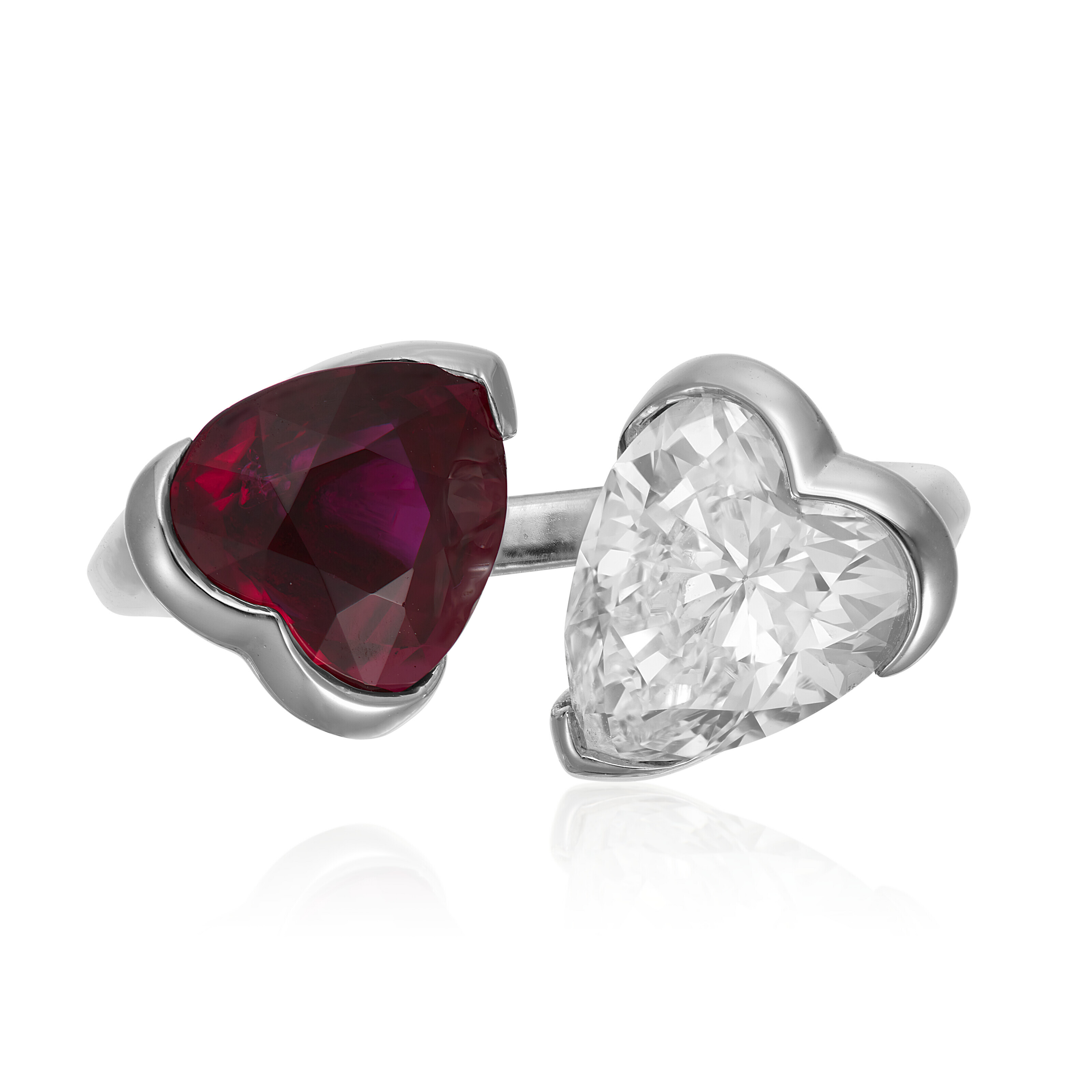 NO RESERVE | REZA TWIN STONE RUBY AND DIAMOND RING, | Christie’s
