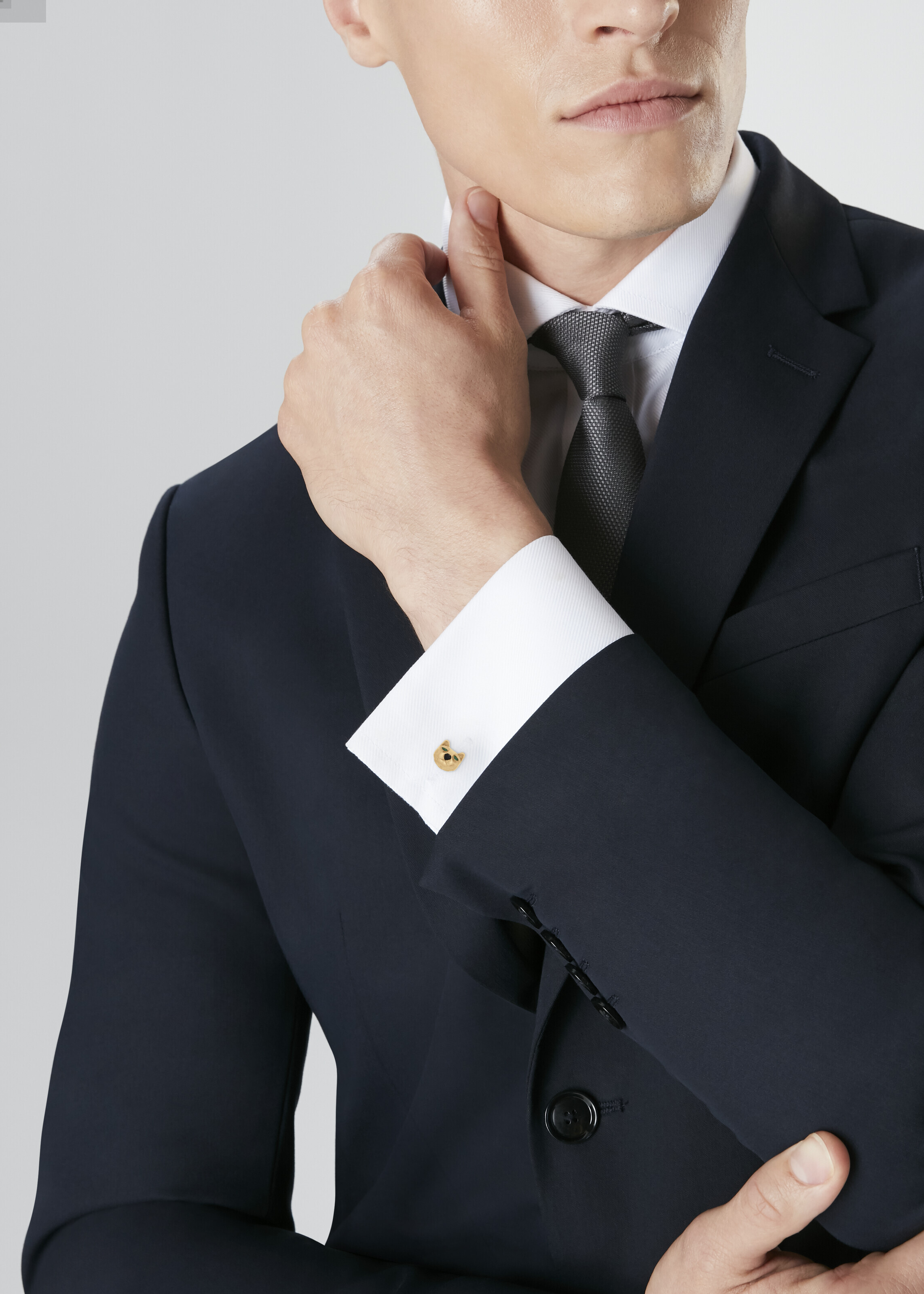 NO RESERVE | CARTIER EMERALD, ONYX AND GOLD PANTHER CUFFLINKS