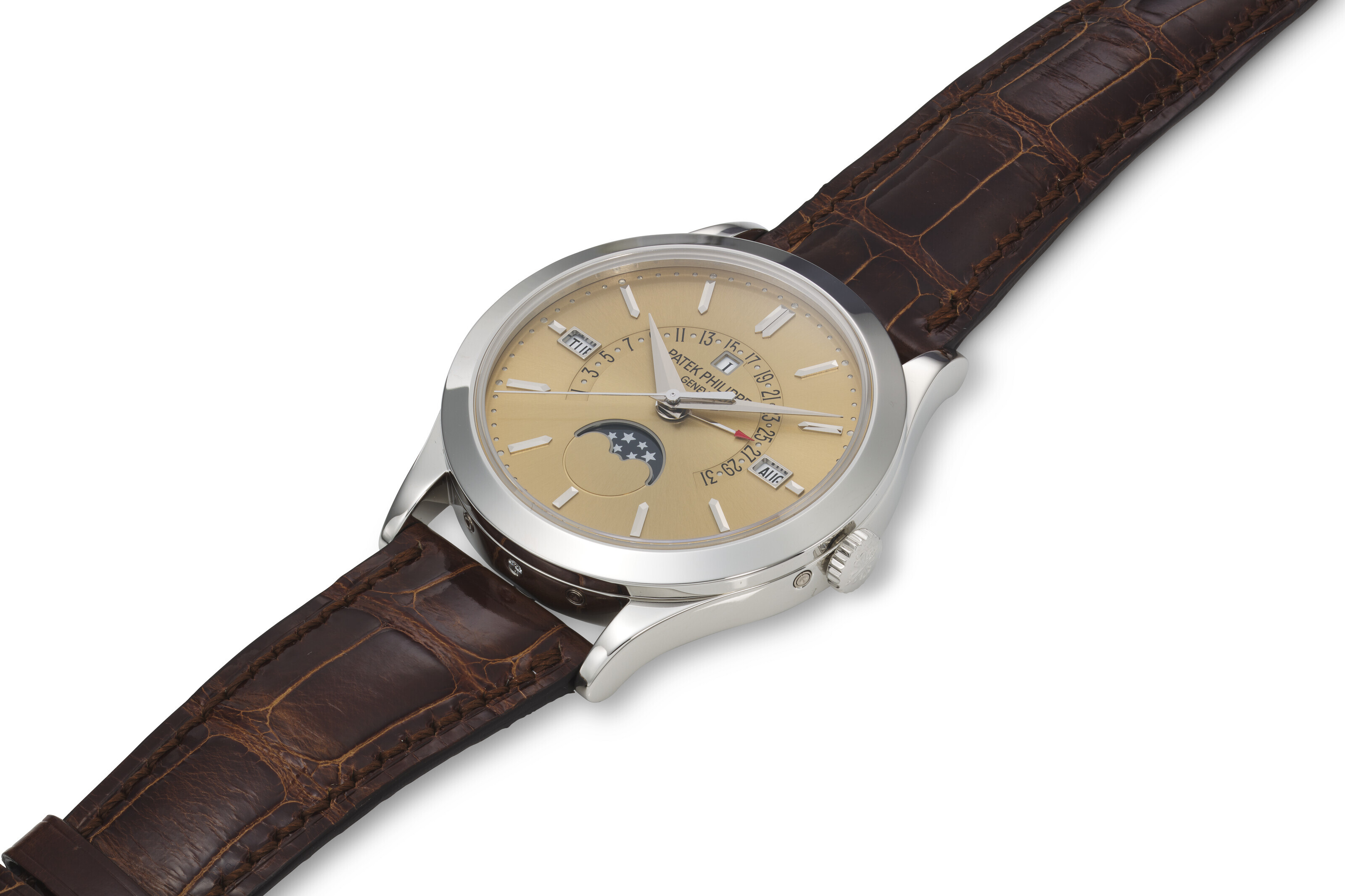 PATEK PHILIPPE REF. 5496P 014 A FINE HONEY BROWN DIAL PLATINUM PERPETUAL CALENDAR WRISTWATCH WITH MOON PHASES AND LEAP YEAR INDICATOR Christie s