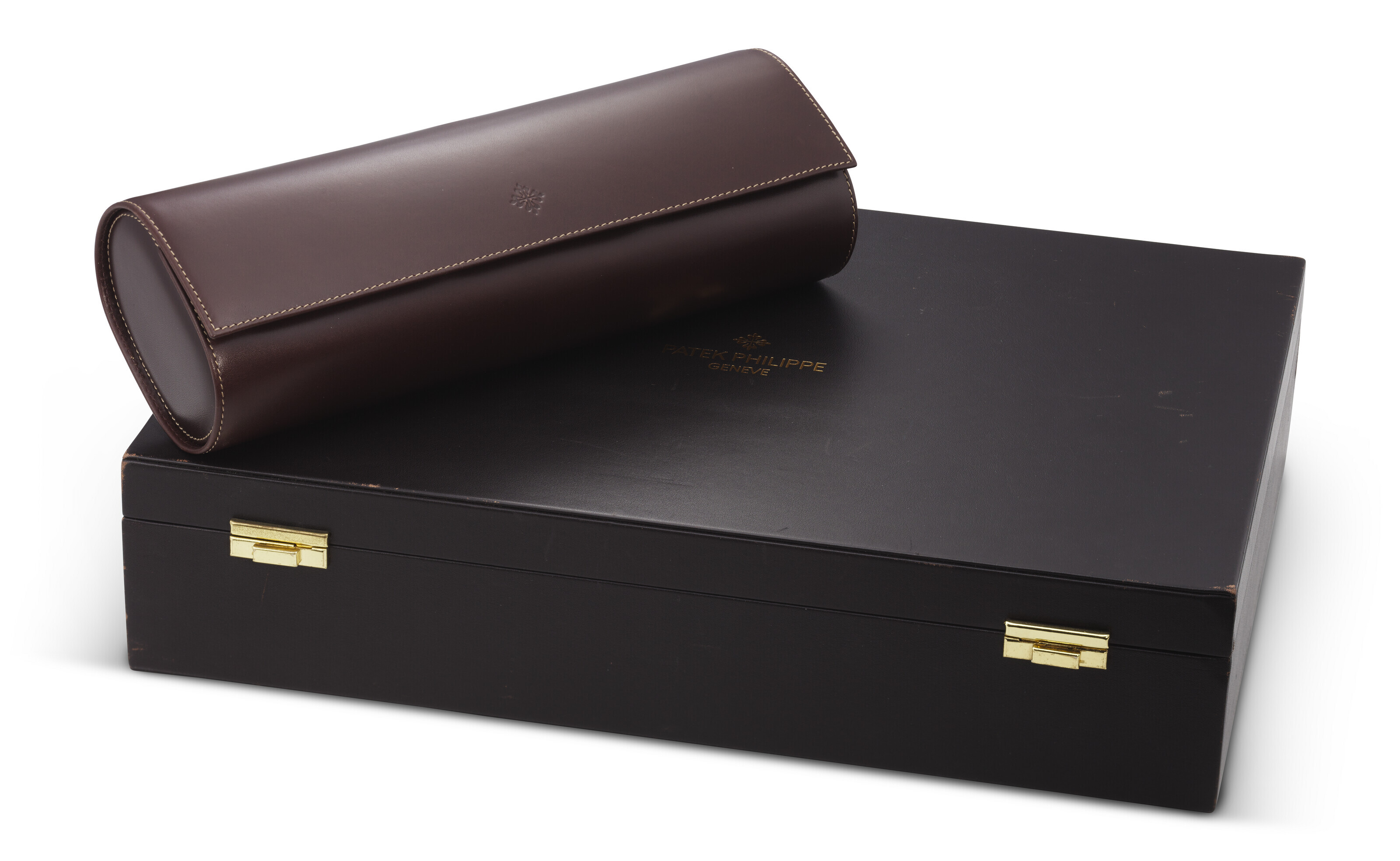 PATEK PHILIPPE, A BROWN LEATHER TRAVEL CASE AND WATCH PRESENTATION