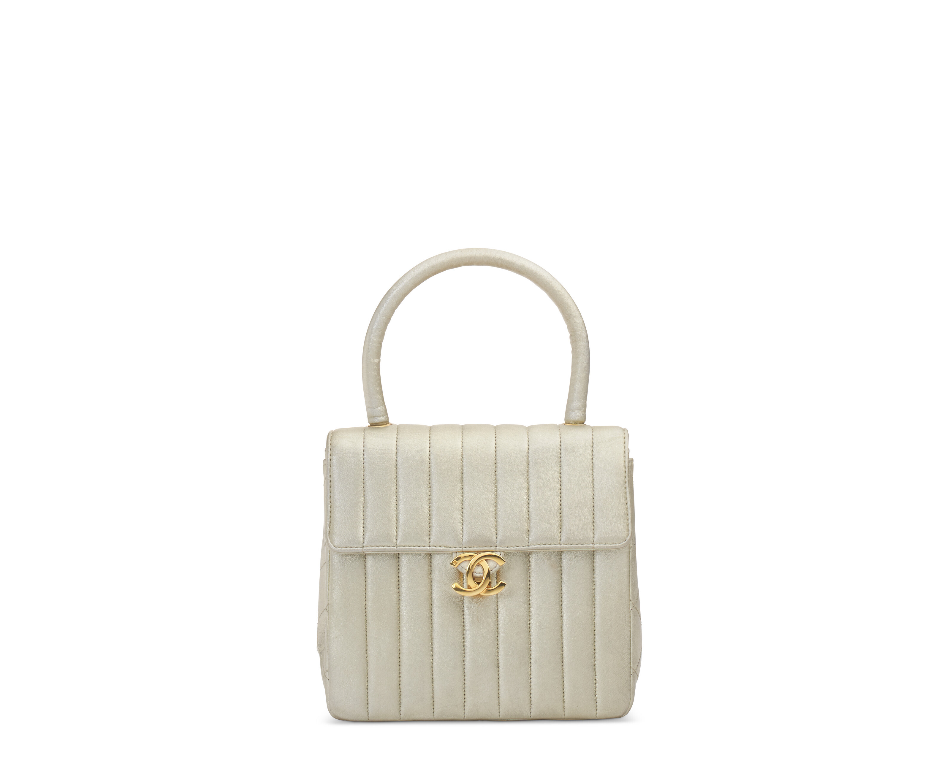 A METALLIC LIGHT GOLD LAMBSKIN LEATHER TOP HANDLE BAG WITH GOLD ...
