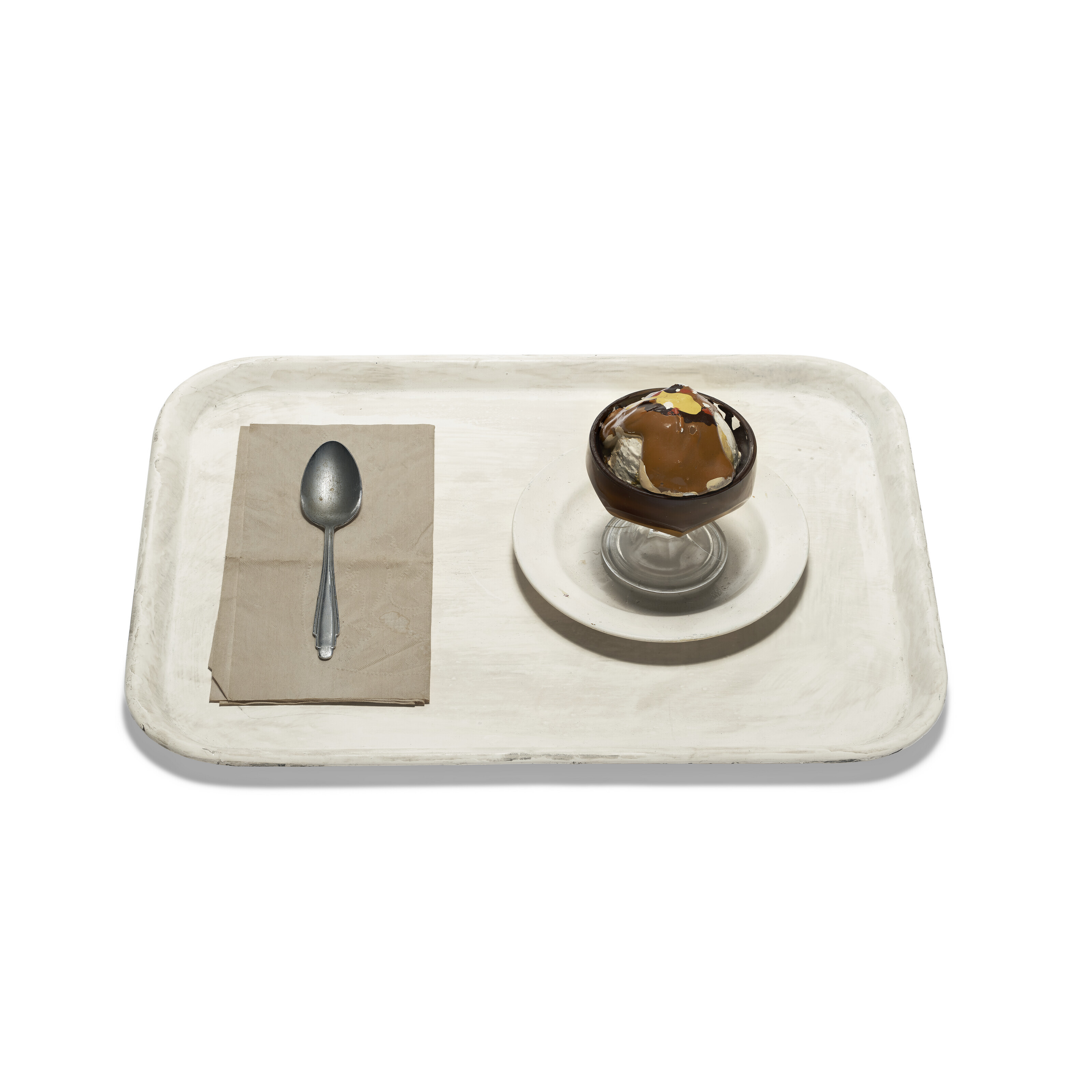 Claes Oldenburg (b. 1929), Ice Cream Sundae on Tray, 1962. Enamel on plaster, glass, ceramic, aluminum spoon, paper napkin and plastic, in six parts. 4⅝ x 16&frac12; x 12 in (11.6 x 41.9 x 30.4 cm). Sold for $107,100 in Post-War &amp; Contemporary Art Day Sale on 18 November at Christie&rsquo;s New York