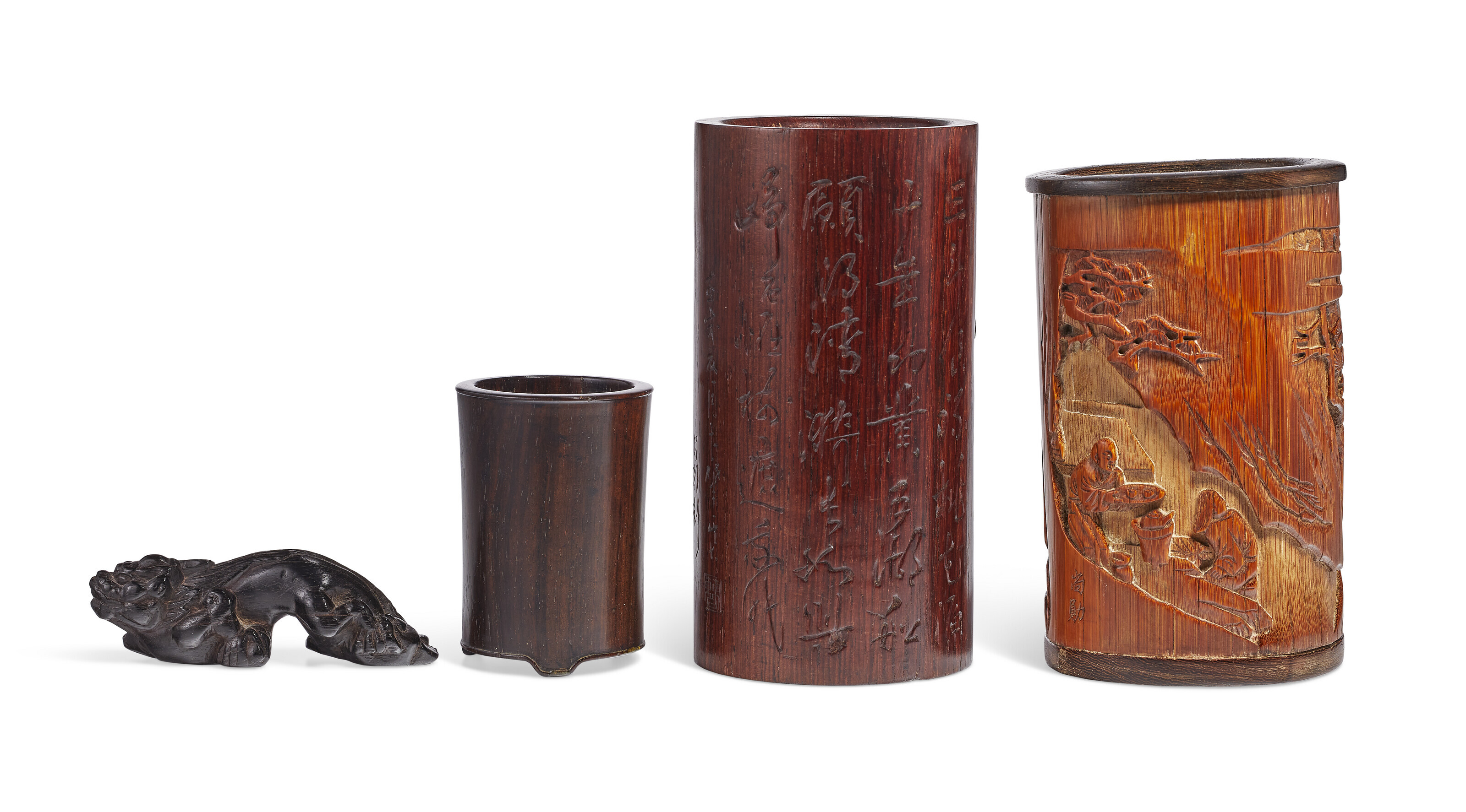 清木雕笔筒三件及紫檀雕瑞兽摆件, QING DYNASTY (1644-1911