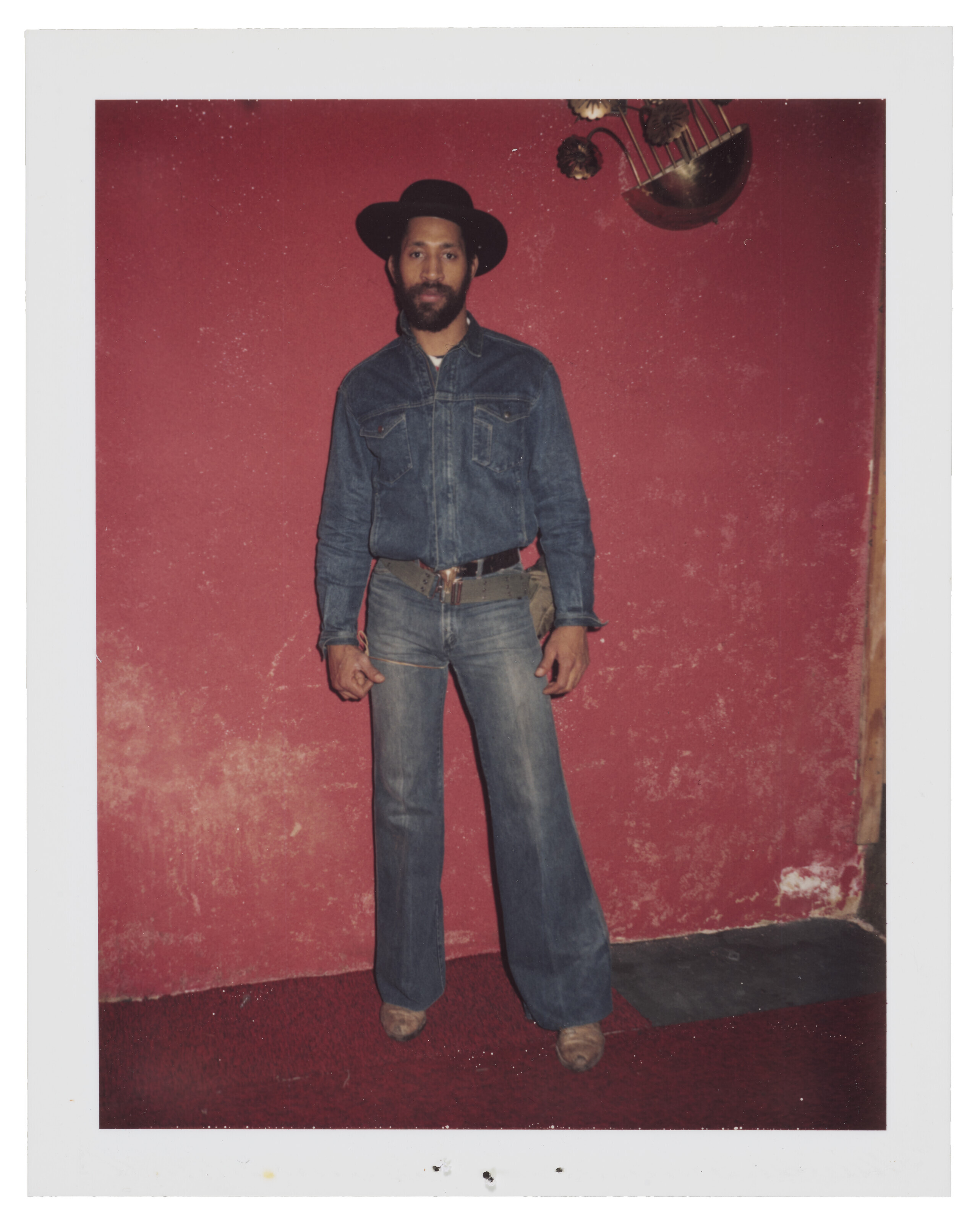 TWO POLAROID PORTRAITS OF DJ KOOL HERC: ONE AT T-CONNECTION, BRONX