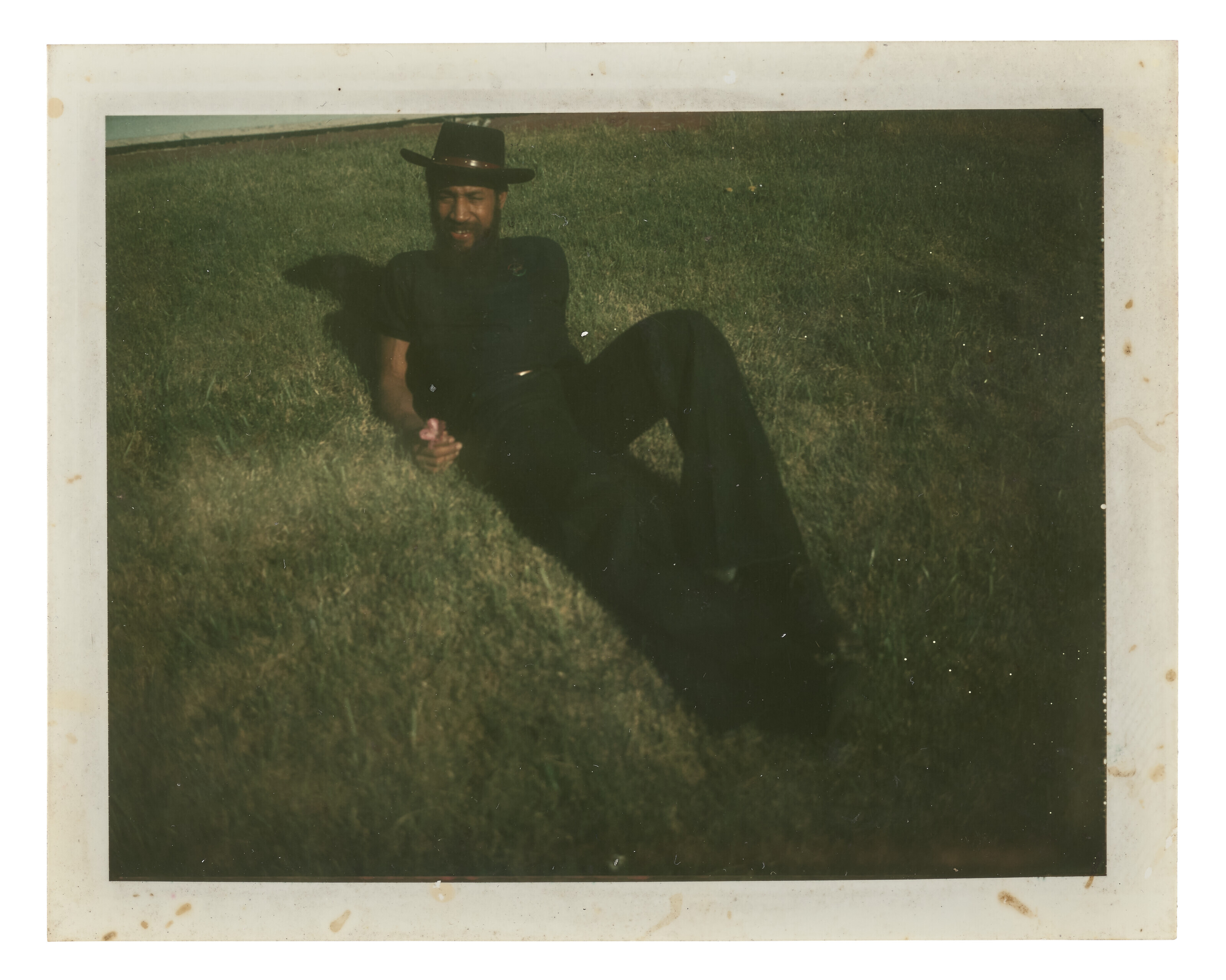 TWO POLAROID PORTRAITS OF DJ KOOL HERC AT AN AFTER-HOURS SPOT