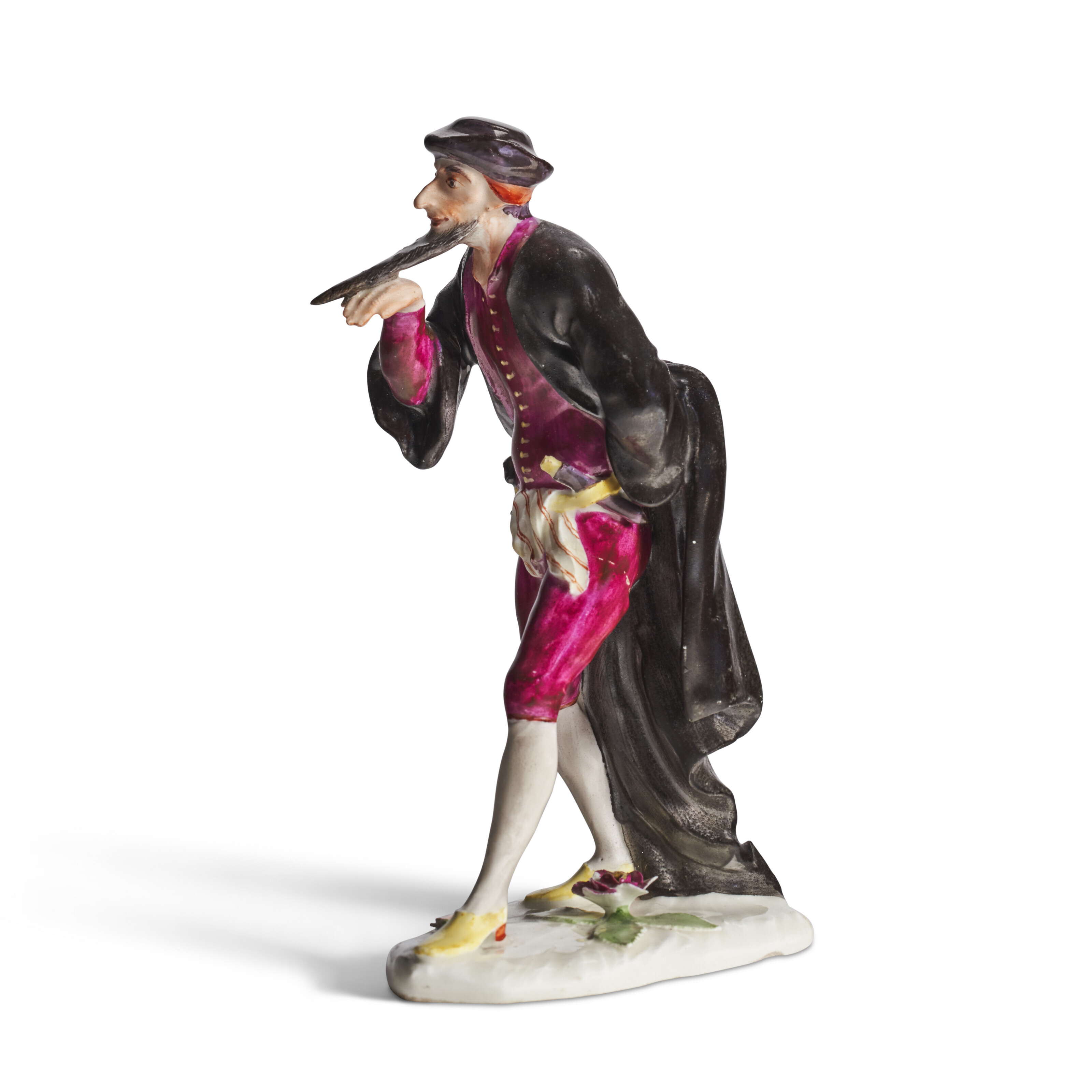 A FÜRSTENBERG PORCELAIN COMMEDIA DELL'ARTE FIGURE OF PANTALONE