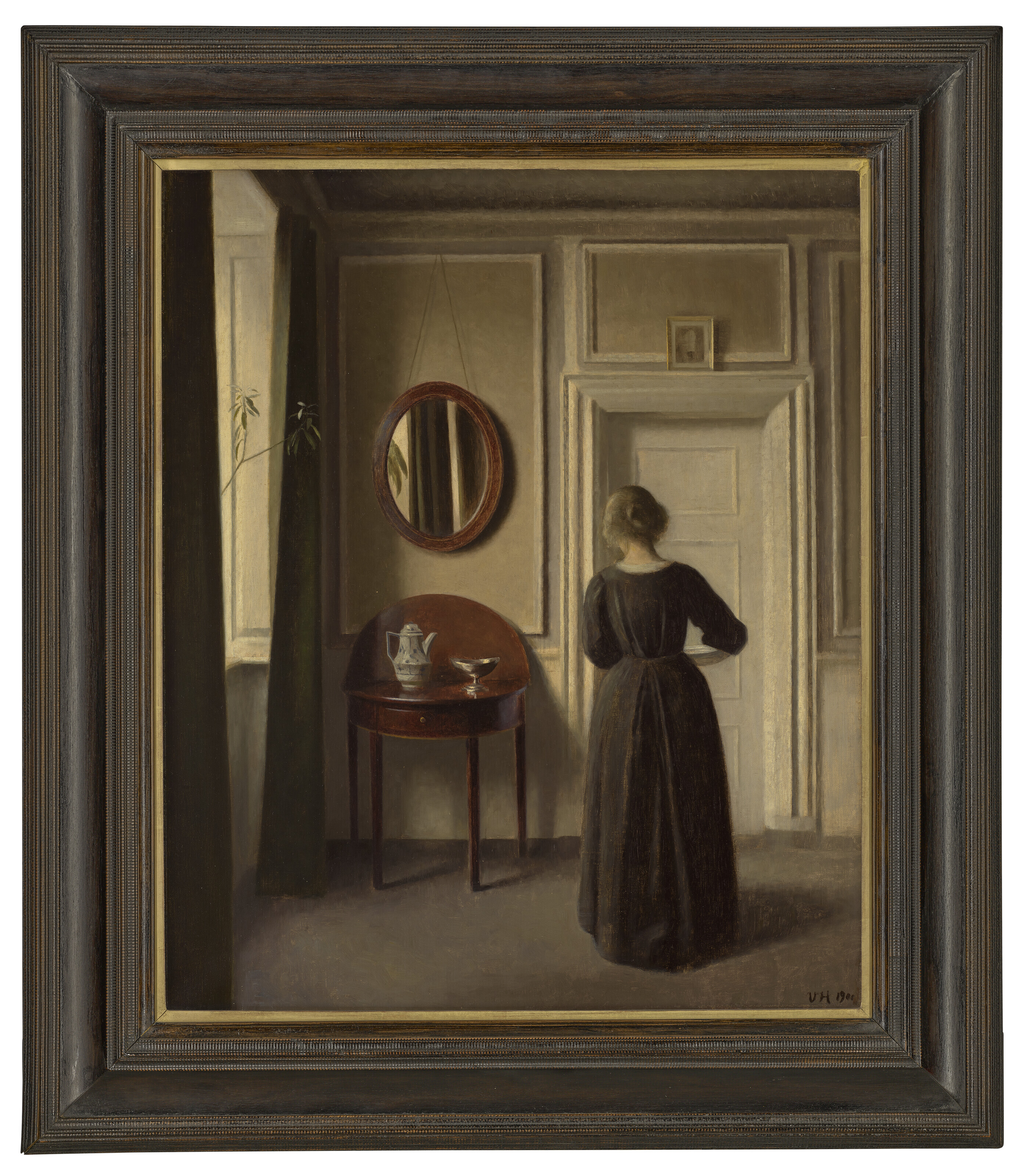 VILHELM HAMMERSHØI (1864-1916), Stue (Interior with an Oval Mirror