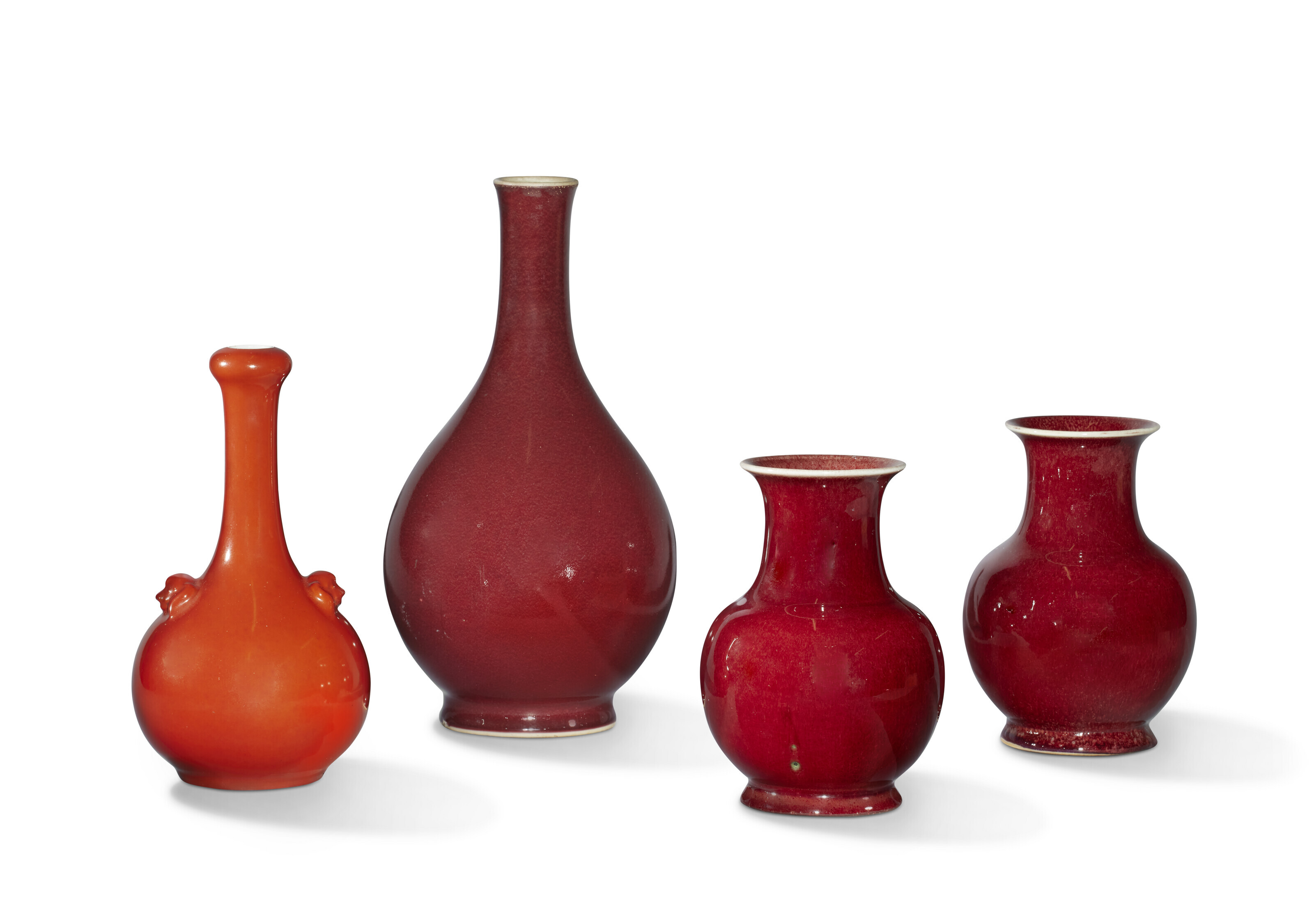 three-copper-red-glazed-vases-and-a-coral-glazed-vase-china-qing