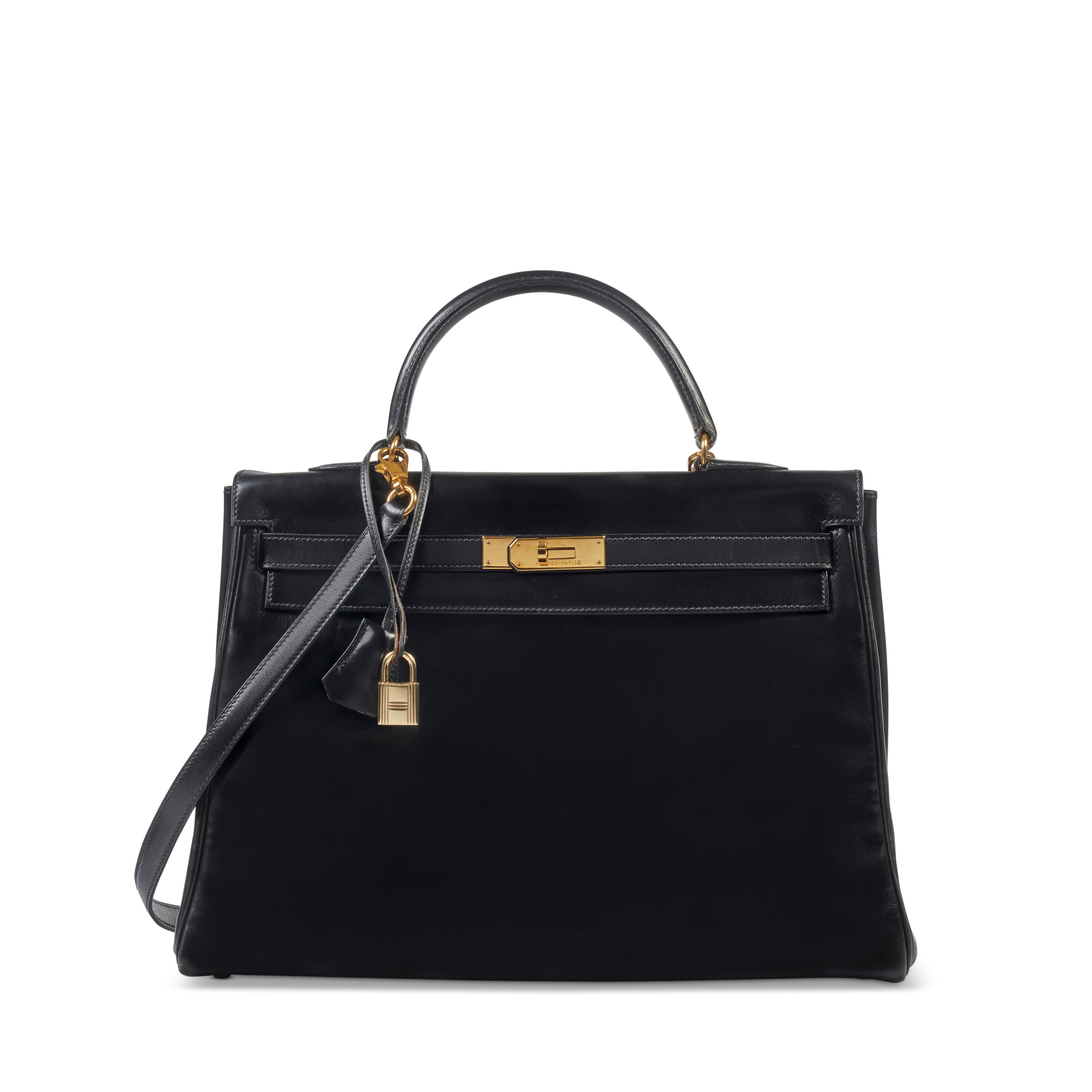 AN EXCEPTIONAL, BLACK CALFBOX LEATHER FEATHERS SO BLACK