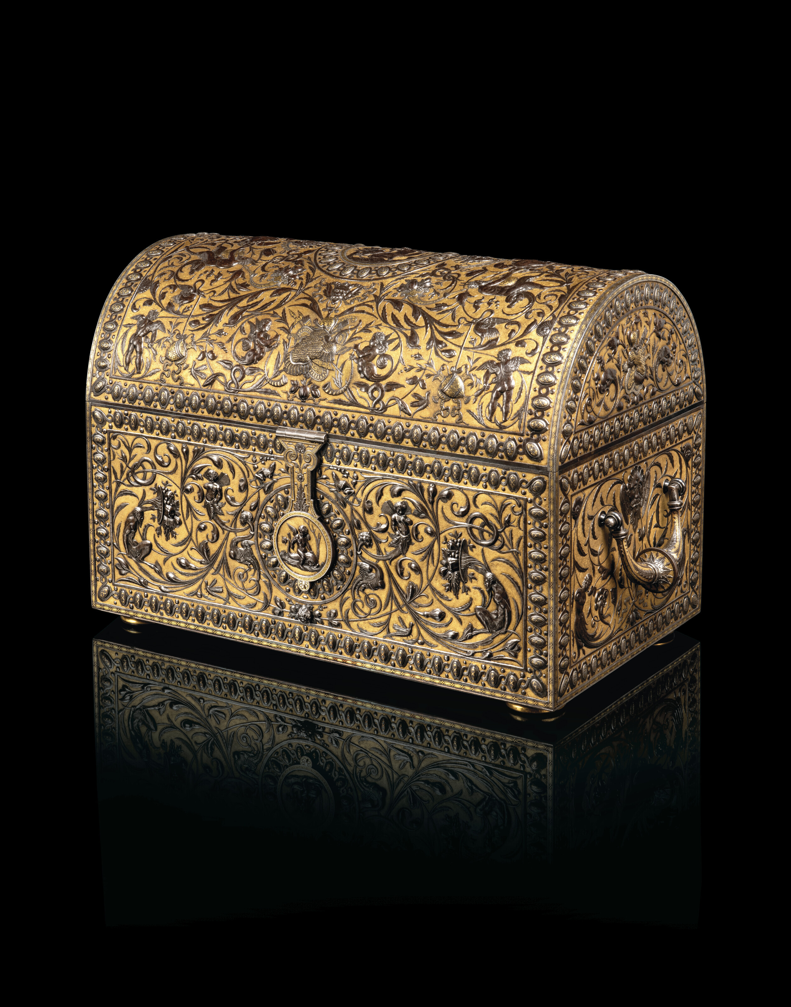 A SPANISH GOLD AND SILVER-DAMASCENED STEEL JEWEL CASKET, BY