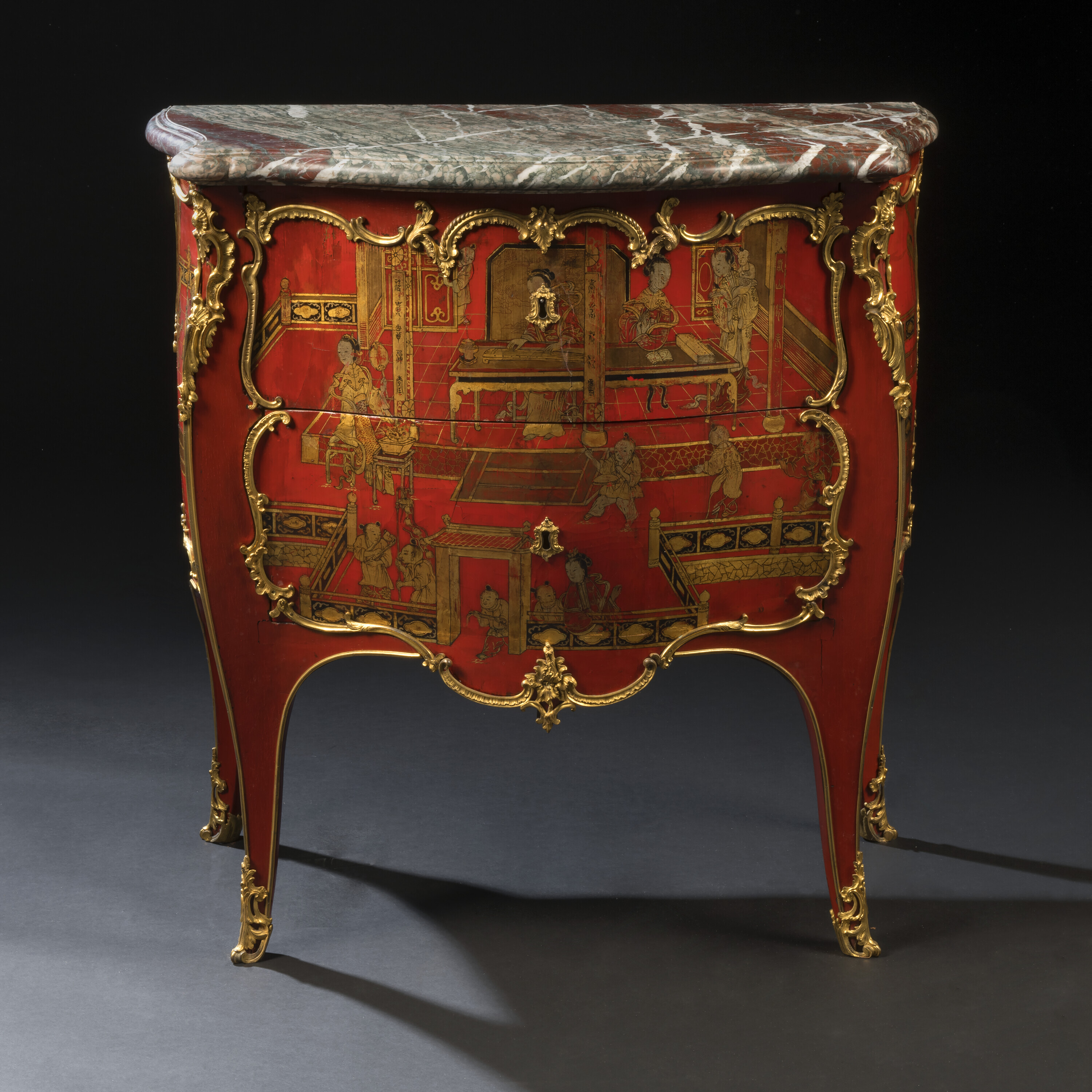 A Louis XV ormolu-mounted red and gilt Chinese lacquer and vernis Martin commode by Adrien Faizelot-Delorme, mid-18th century. 34 in (86.5 cm) high. Sold for £94,500 on 18 April 2023 at Christie’s Online