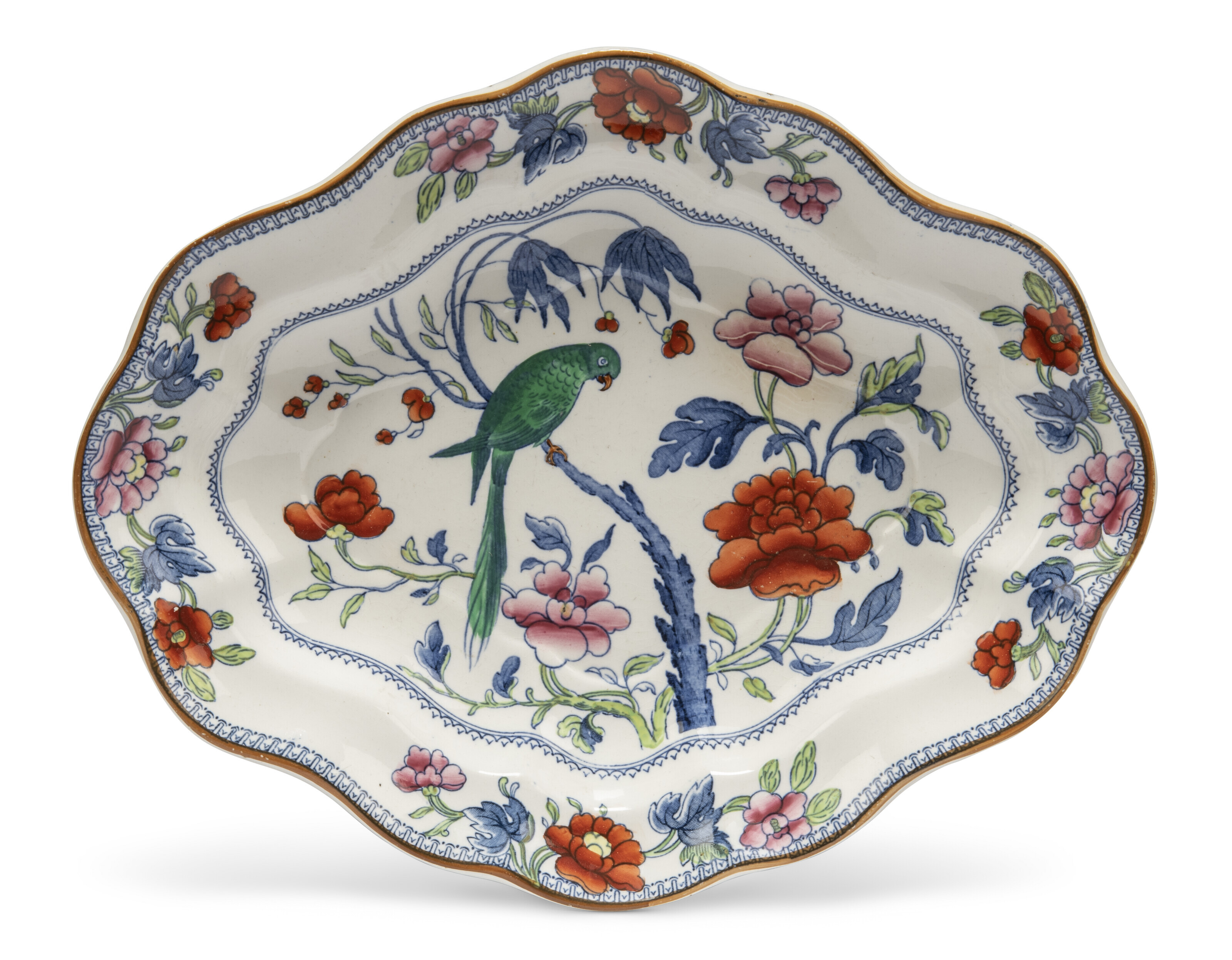 A BOOTHS SILICON CHINA 'GREEN PARROT' PATTERN COMPOSITE PART TABLE