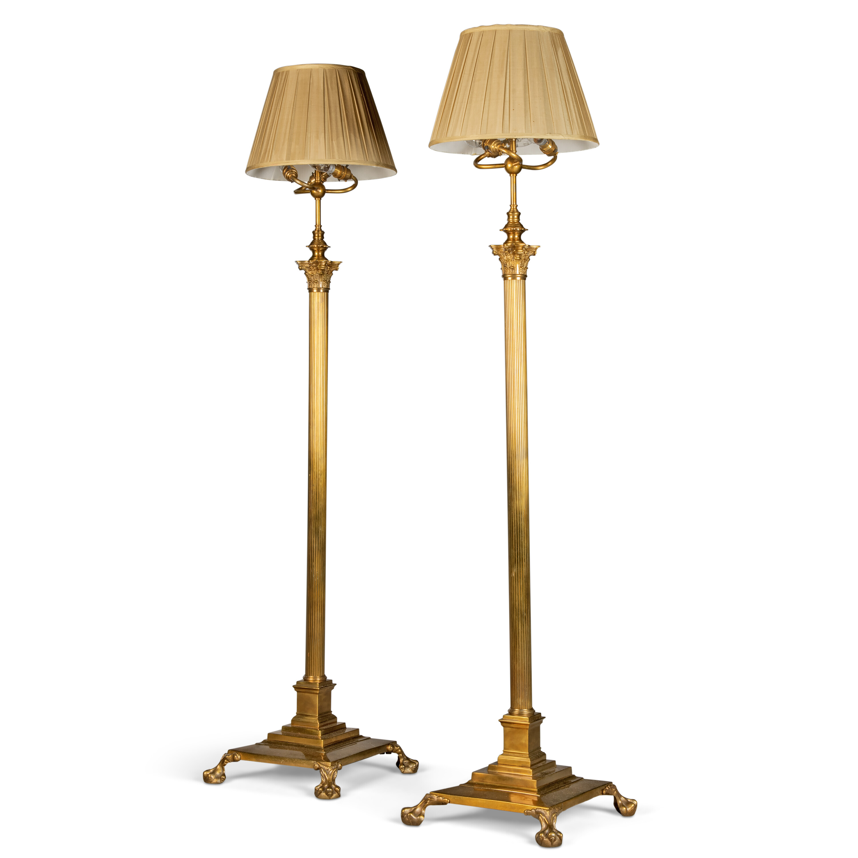A PAIR OF LACQUERED BRASS TELESCOPIC STANDARD LAMPS, MODERN Christie’s