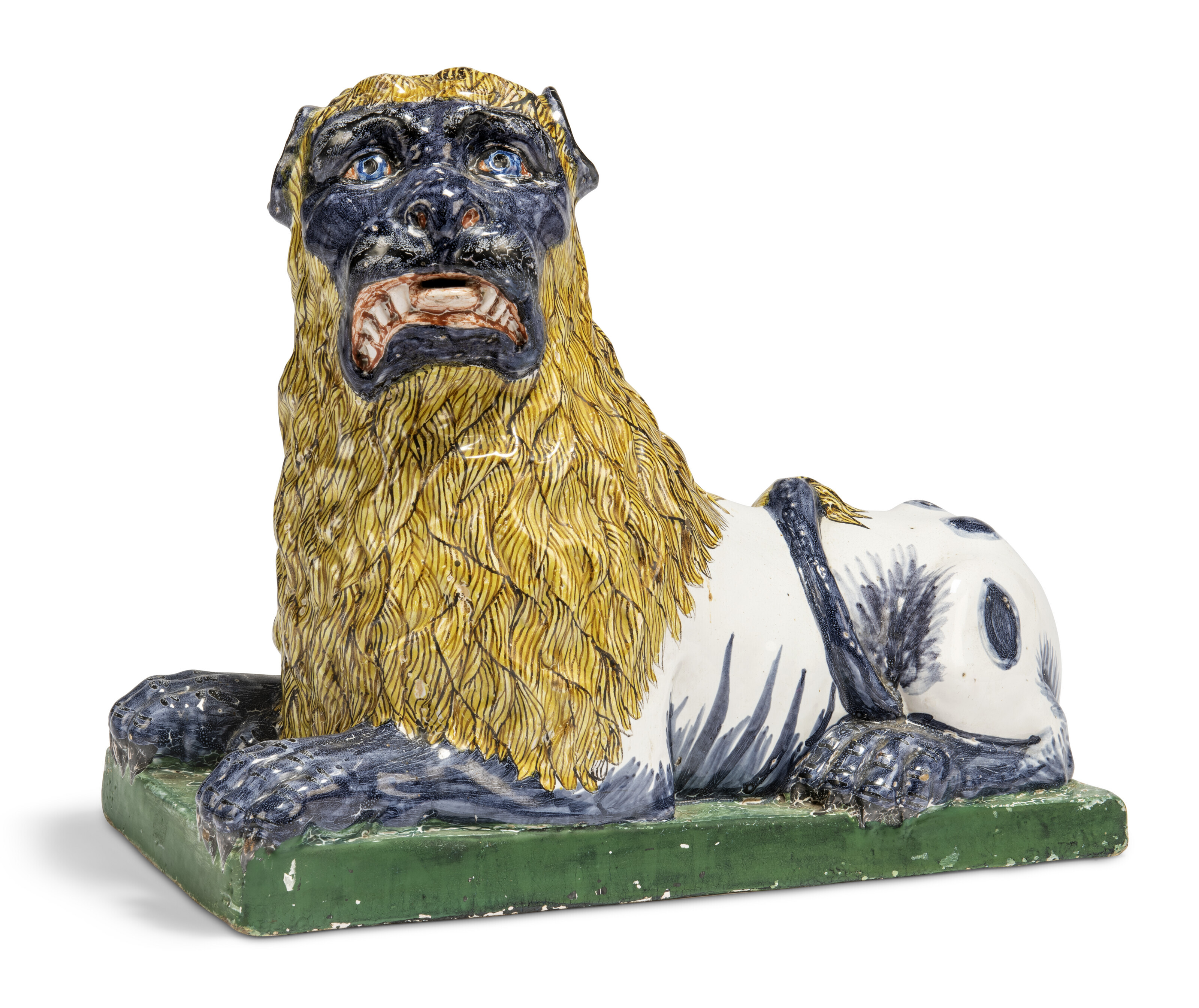 A FRENCH FAIENCE LARGE MODEL OF A LION, 19TH CENTURY, PROBABLY