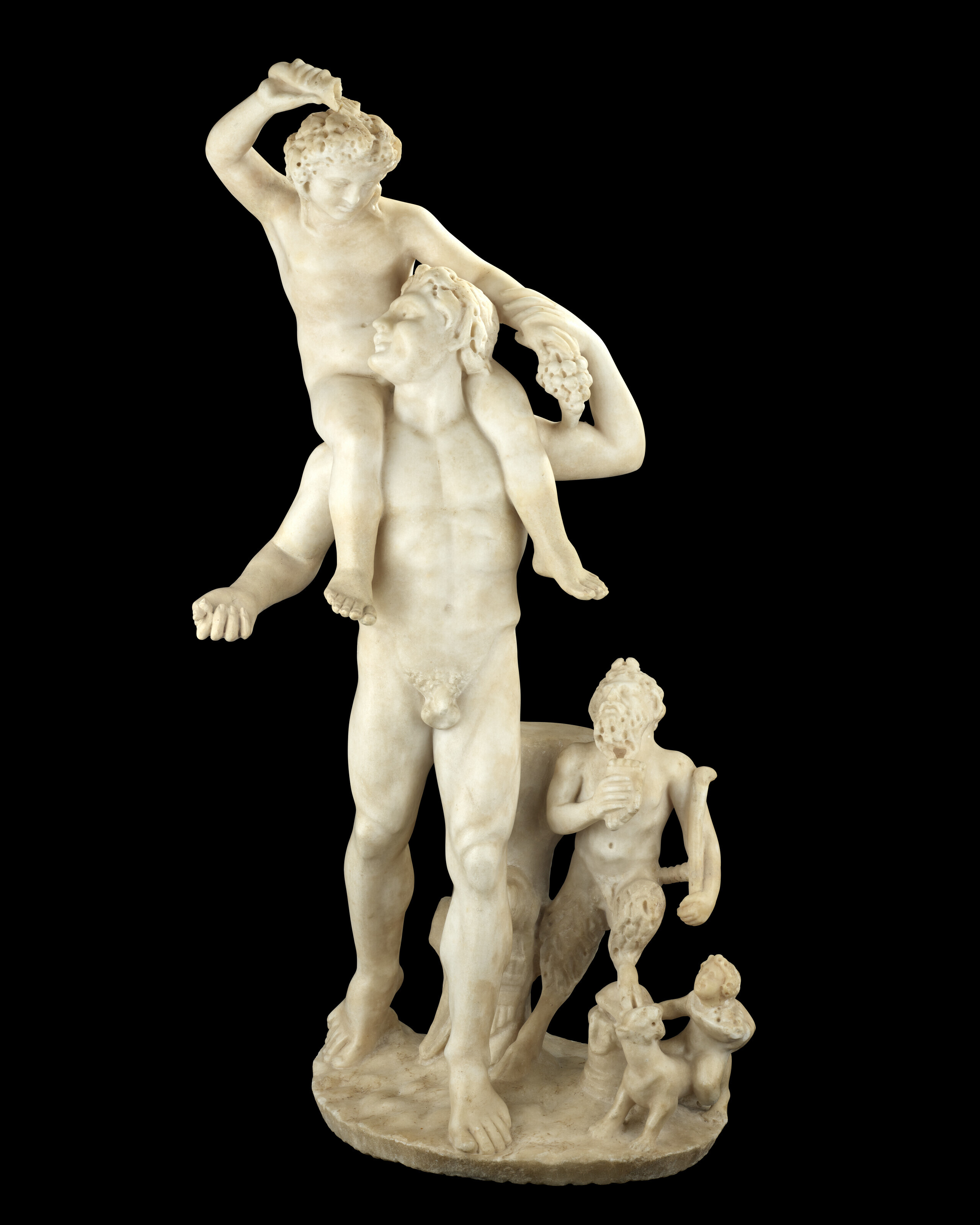 A Roman marble group statue of Bacchus, a satyr, Pan and Cupid, circa early 3rd century A.D., offered in Ancient to Modern Art from the Mougins Museum of Classical Art, Part I on 7 December 2023 at Christie's in London