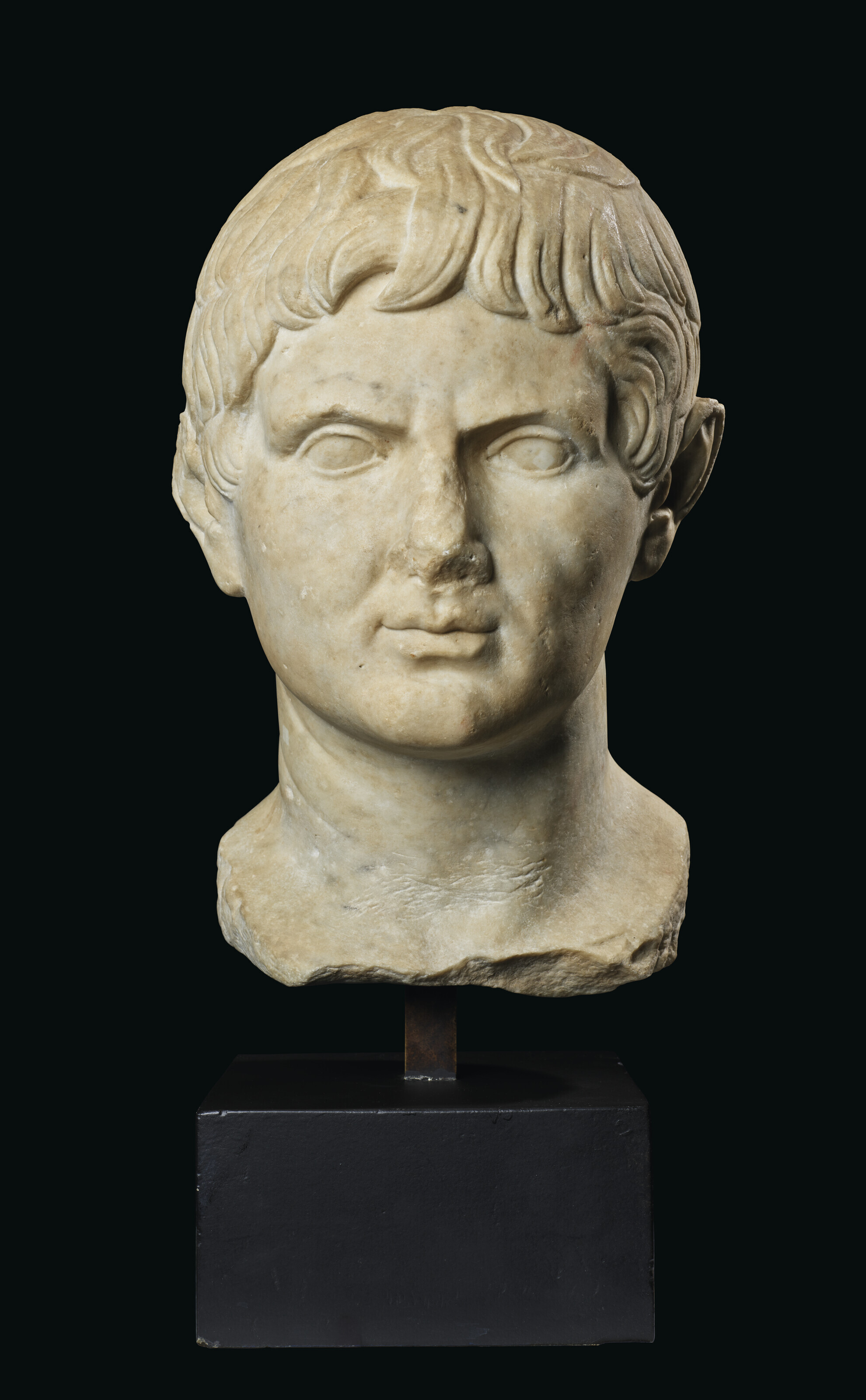 A monumental Roman marble portrait head of the Emperor Augustus, Julio-Claudian period, circa early 1st century A.D., offered in Ancient to Modern Art from the Mougins Museum of Classical Art, Part I on 7 December 2023 at Christie's in London