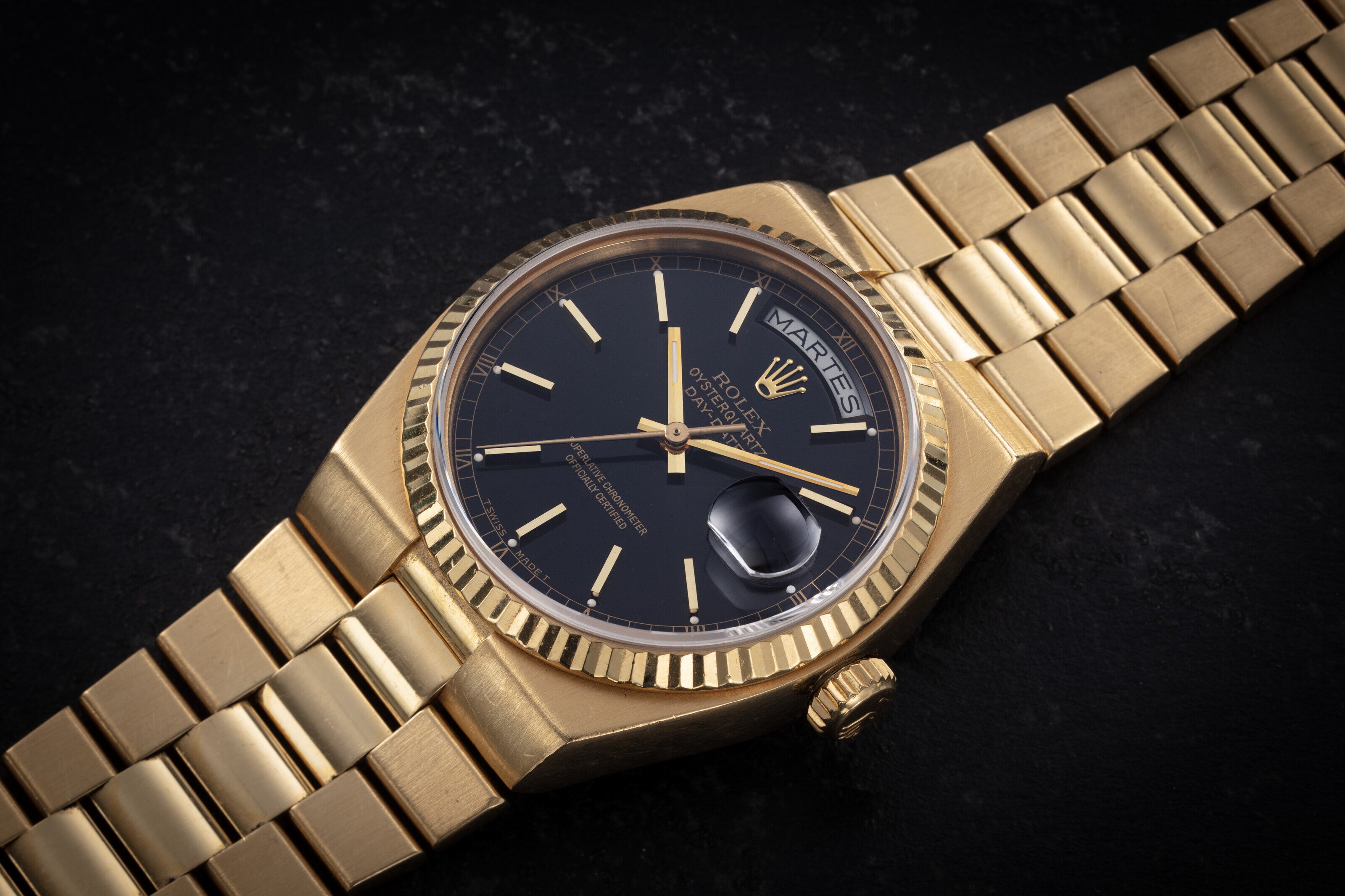 ROLEX, OYSTERQUARTZ DAYDATE REF. 19018, A RARE GOLD QUARTZ WRISTWATCH