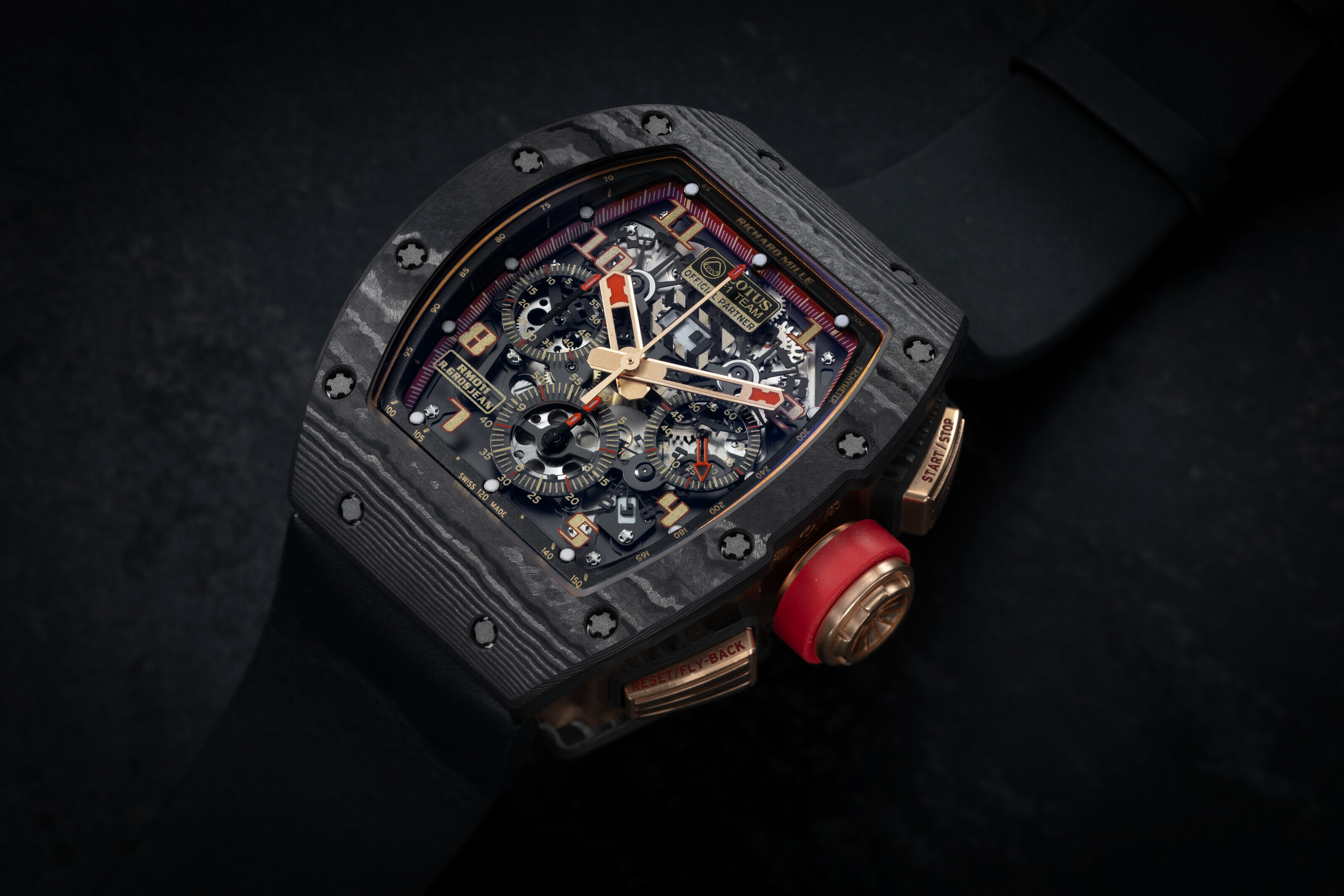 RICHARD MILLE RM011 AO RG CA ROMAIN GROSJEAN LOTUS F1 AN ATTRACTIVE NTPT CARBON AND GOLD AUTOMATIC FLYBACK CHRONOGRAPH