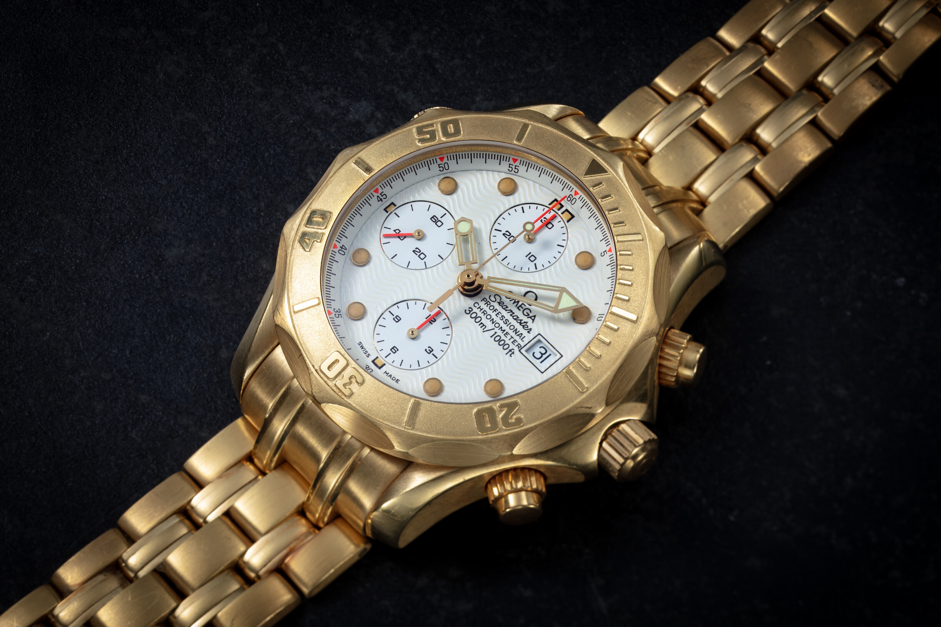 OMEGA, SEAMASTER PROFESSIONAL, A GOLD AUTOMATIC CHRONOGRAPH