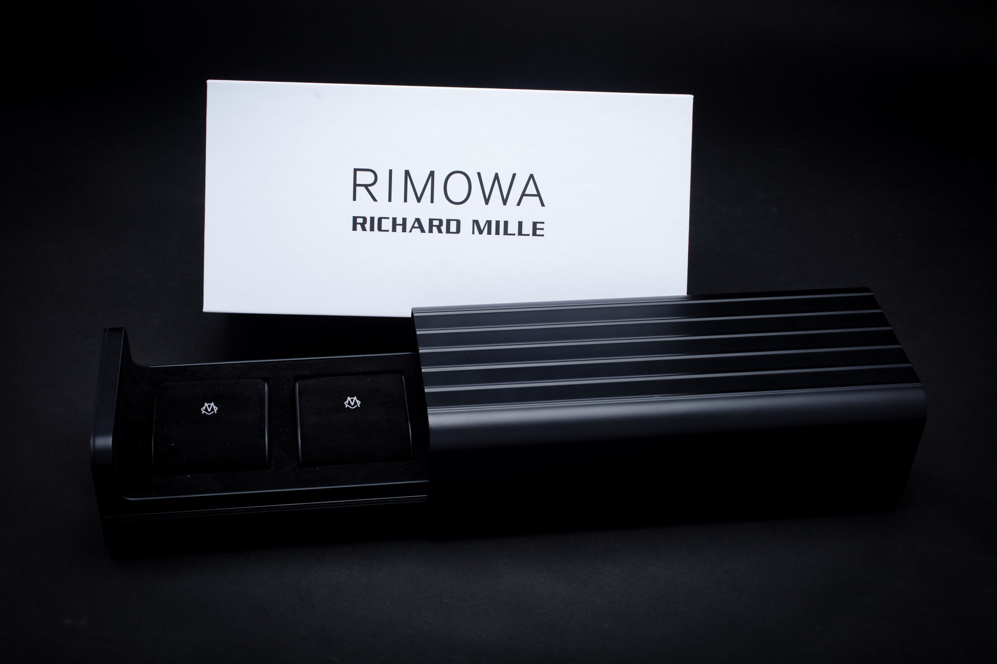 RICHARD MILLE X RIMOWA, A DESIRABLE BLACK ALUMINIUM WATCH CASE