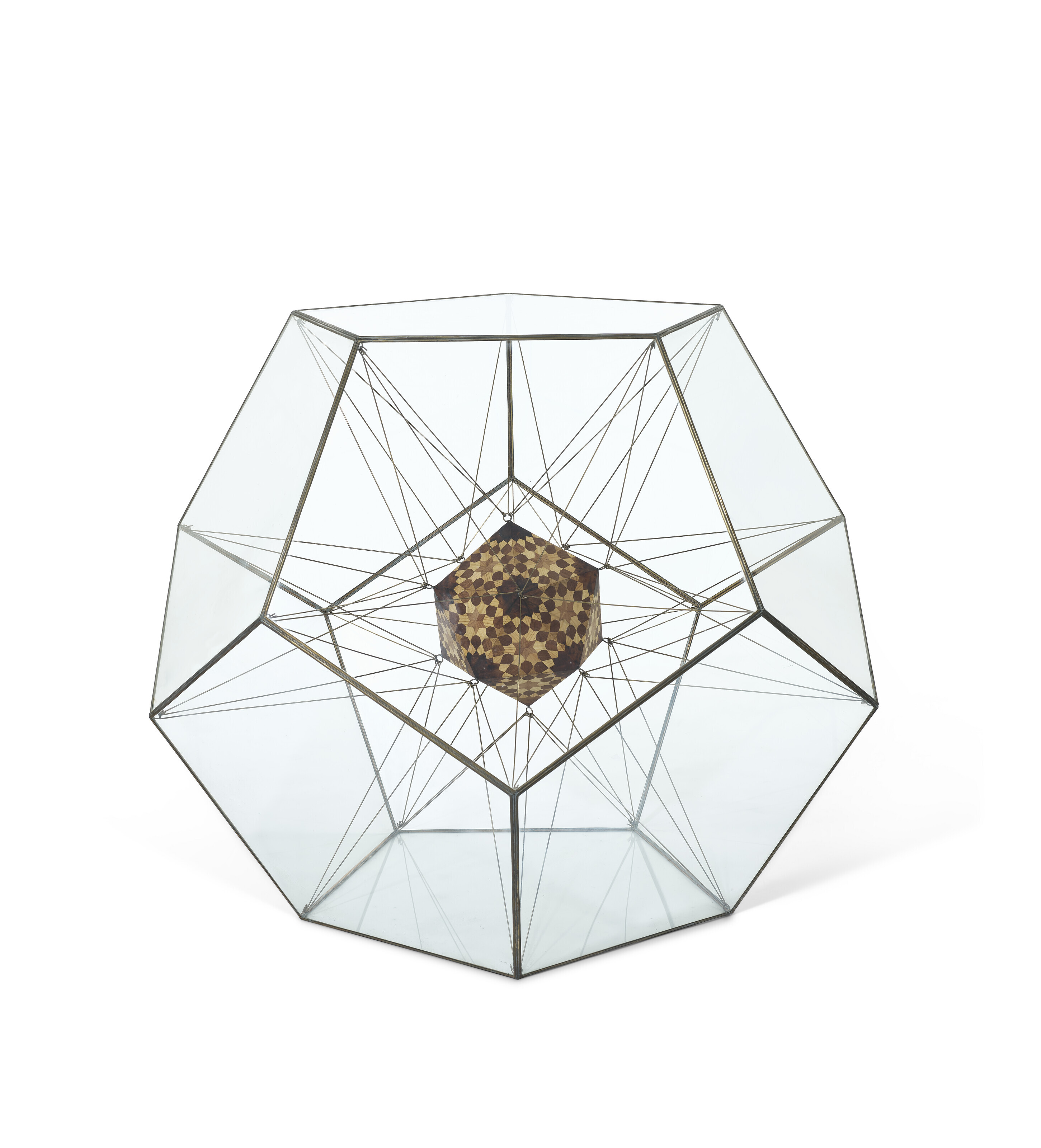 Dana Awartani (b. 1987), Icosahedron within a Dodecahedron (from The Platonic Solid Duals), 2016. Wood, copper and glass. 46⅛ x 48⅞ x 48⅞ in (117 x 124 x 124 cm). This work is variation number two from an edition of three. Sold for $35,280 on 16 May 2023 at Christie’s Online